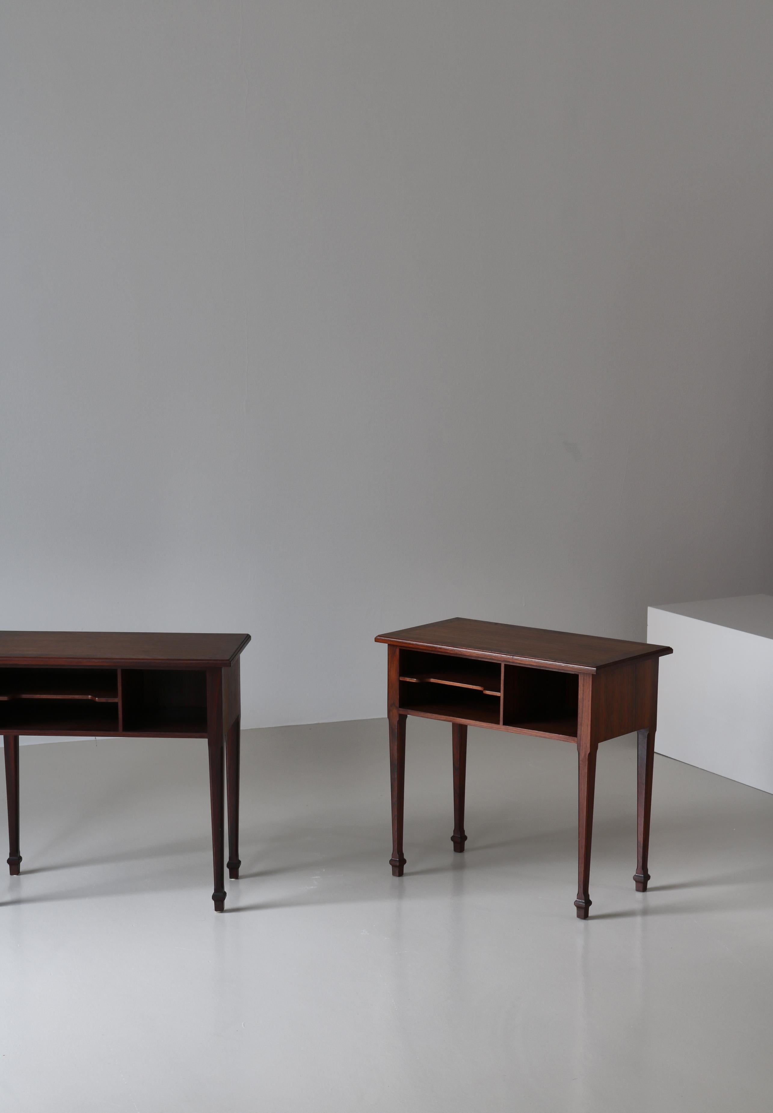 Elegant set of rosewood side tables made in Denmark in the 1930s. Attributed to Ernst Kühn and probably made at Lysberg, Hansen & Therp, Copenhagen. Beautiful profiled edges and tapered legs.