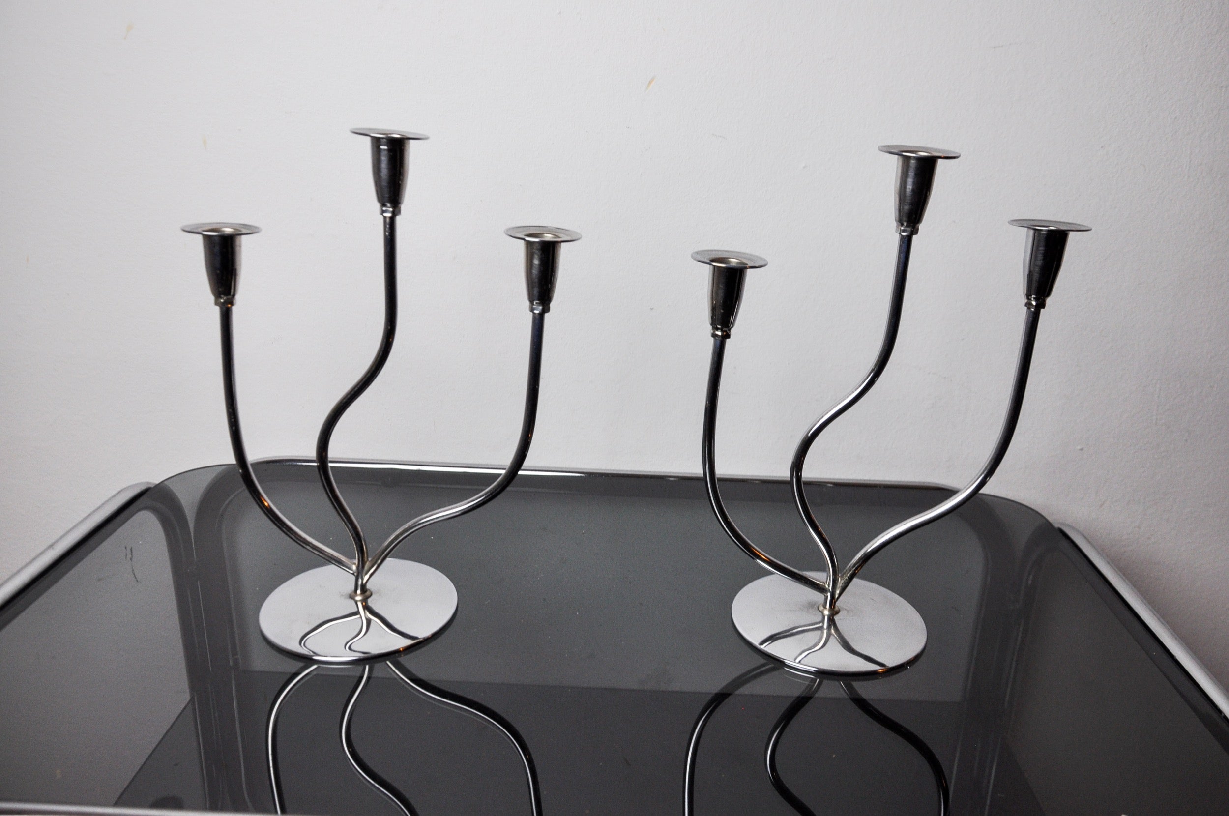 Hollywood Regency Pair of art deco stainless steel 3-flame candlesticks, Spain, 1970 For Sale