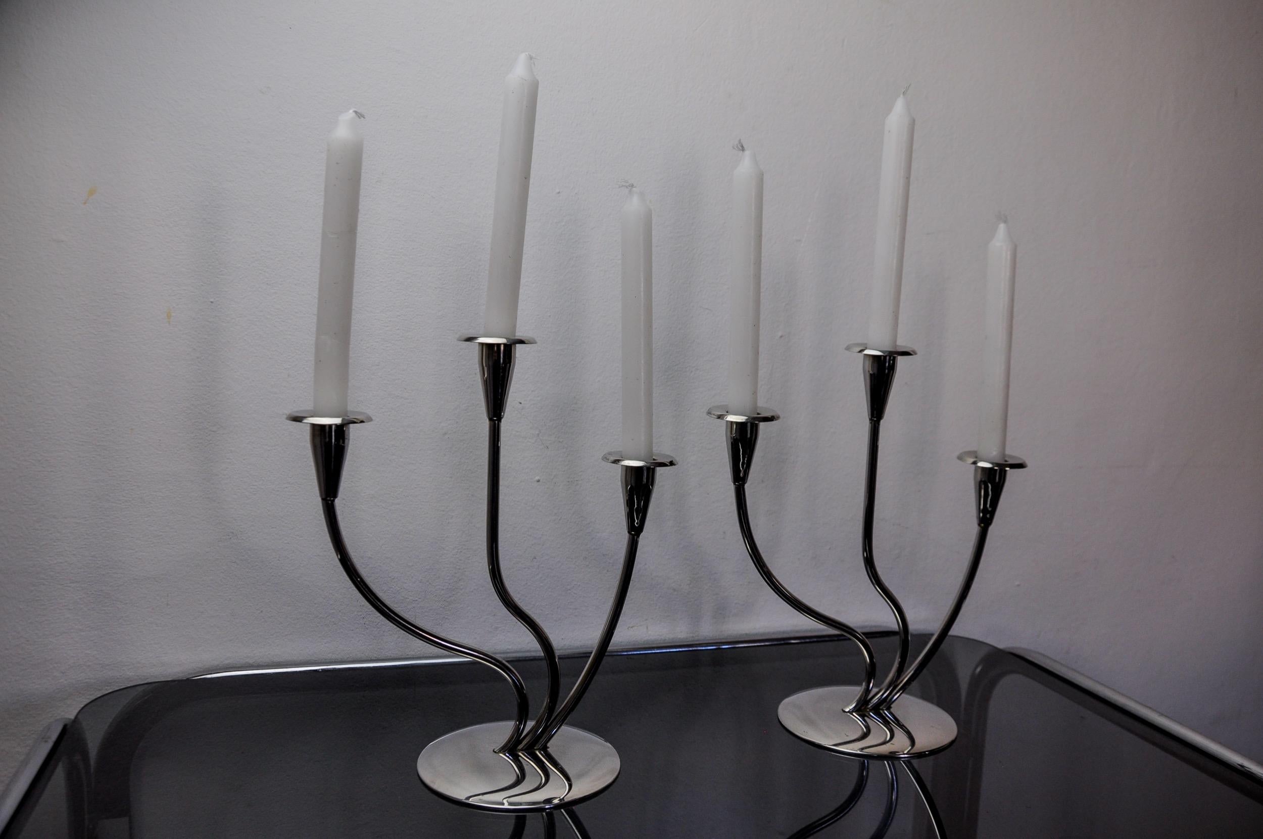 Spanish Pair of art deco stainless steel 3-flame candlesticks, Spain, 1970 For Sale