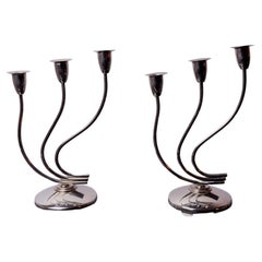 Pair of art deco stainless steel 3-flame candlesticks, Spain, 1970