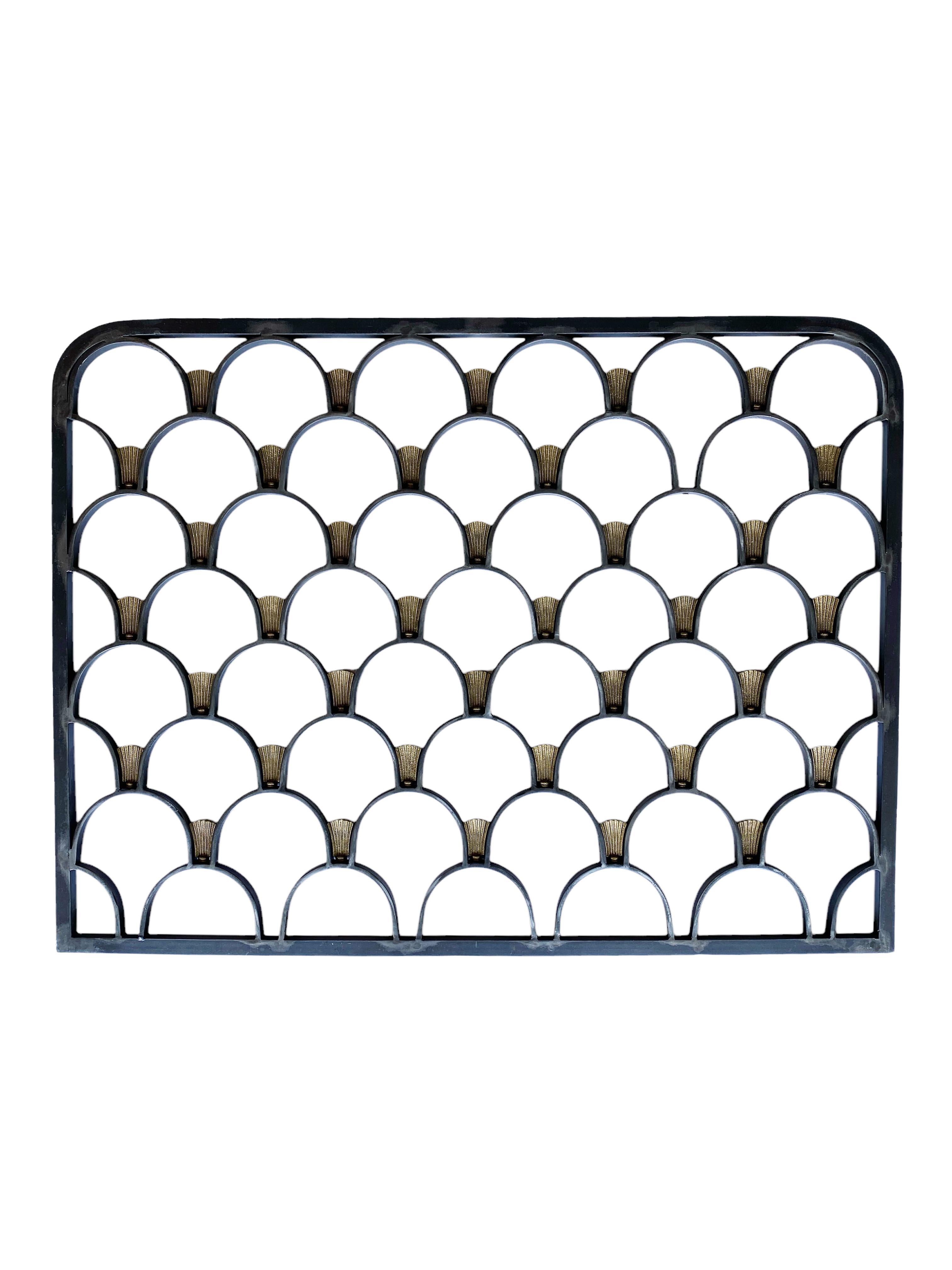 Absolutely! Here's a detailed and compelling description for your pair of steel and brass grates:

---

This striking pair of steel and brass grates is a rare find, believed to date back to the Art Deco period and showcasing the bold elegance