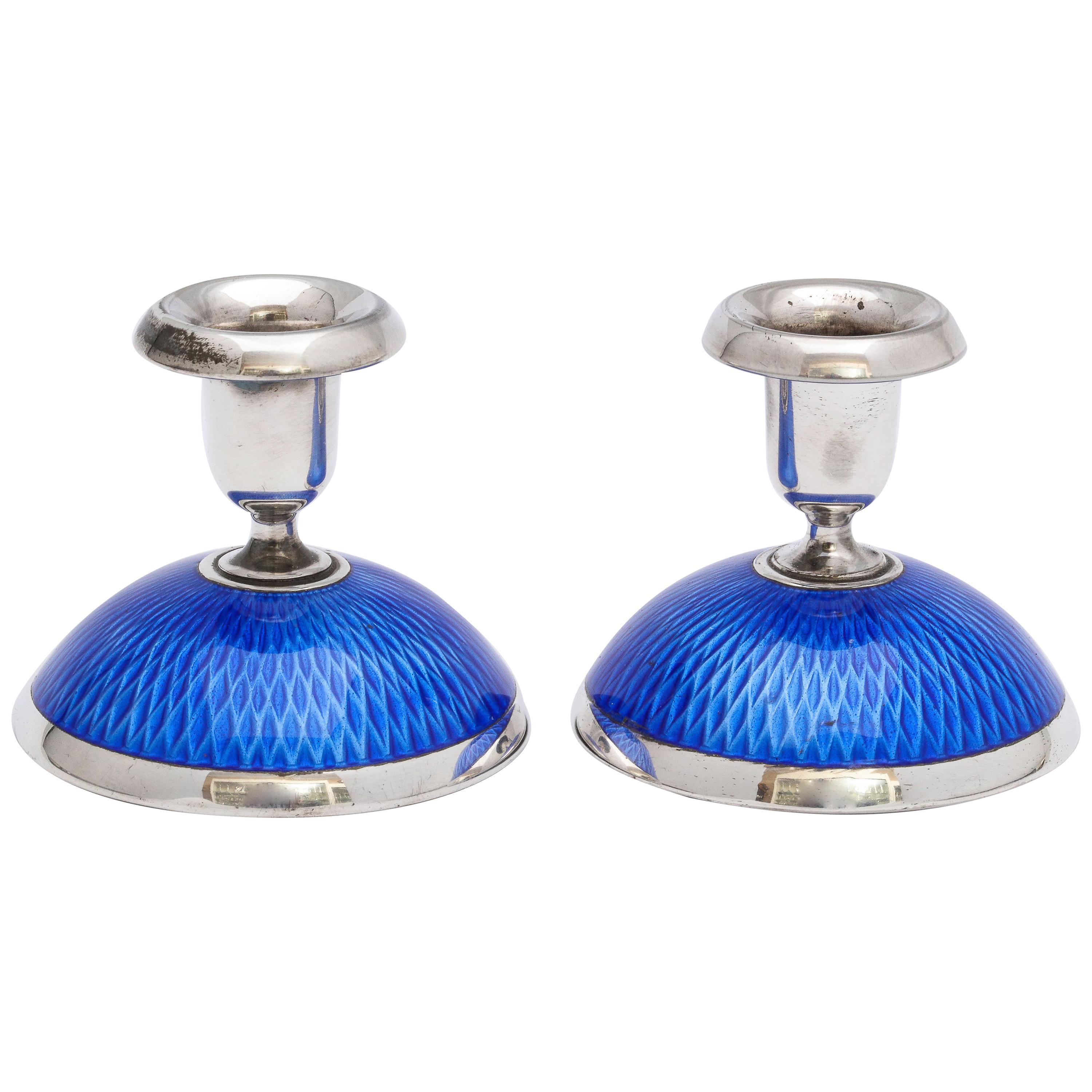 Pair of Art Deco Sterling Silver and Dark Blue Guilloche Enamel Candlesticks