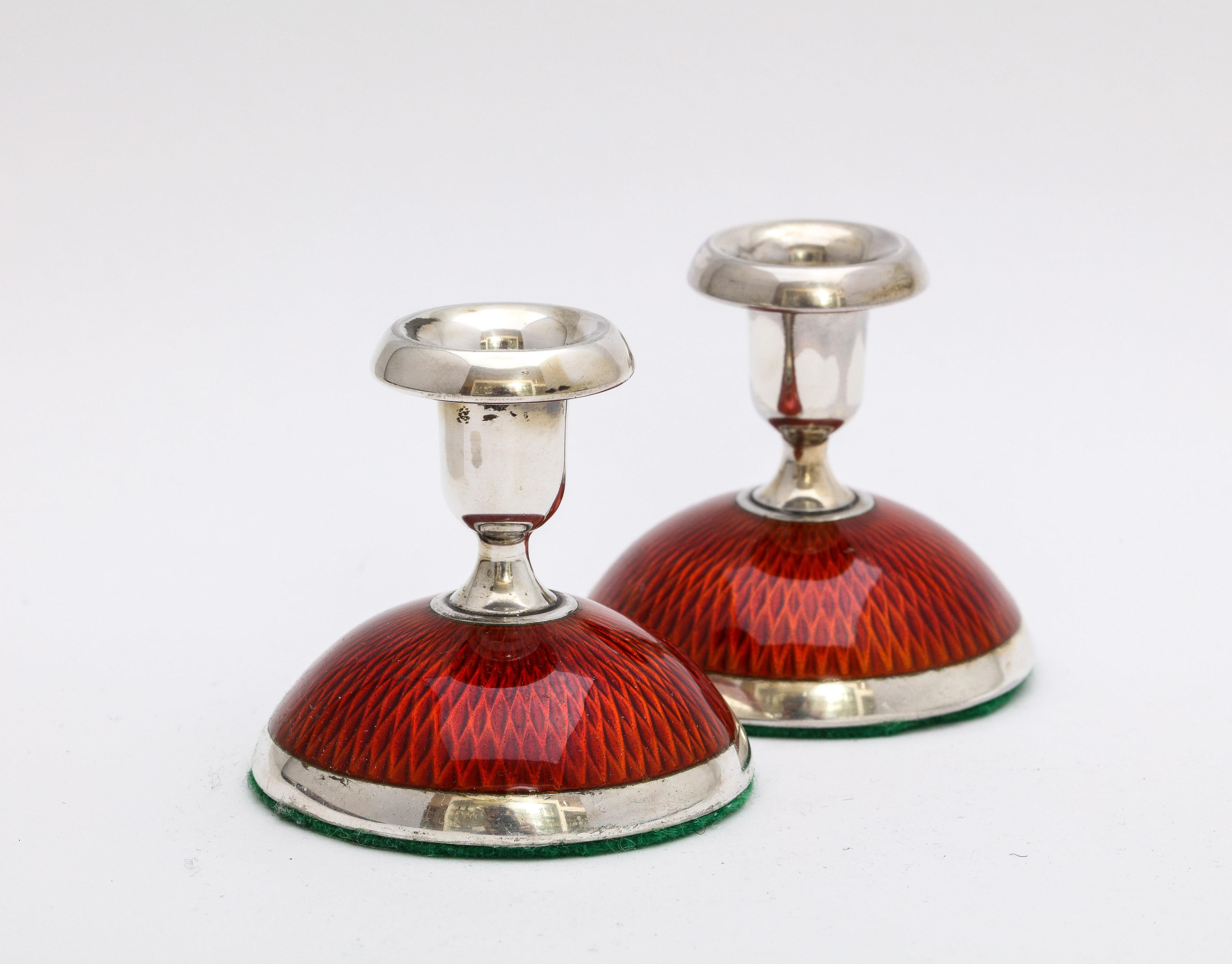 Norwegian Pair of Art Deco Sterling Silver and Deep Reddish-Orange Enamel Candlesticks