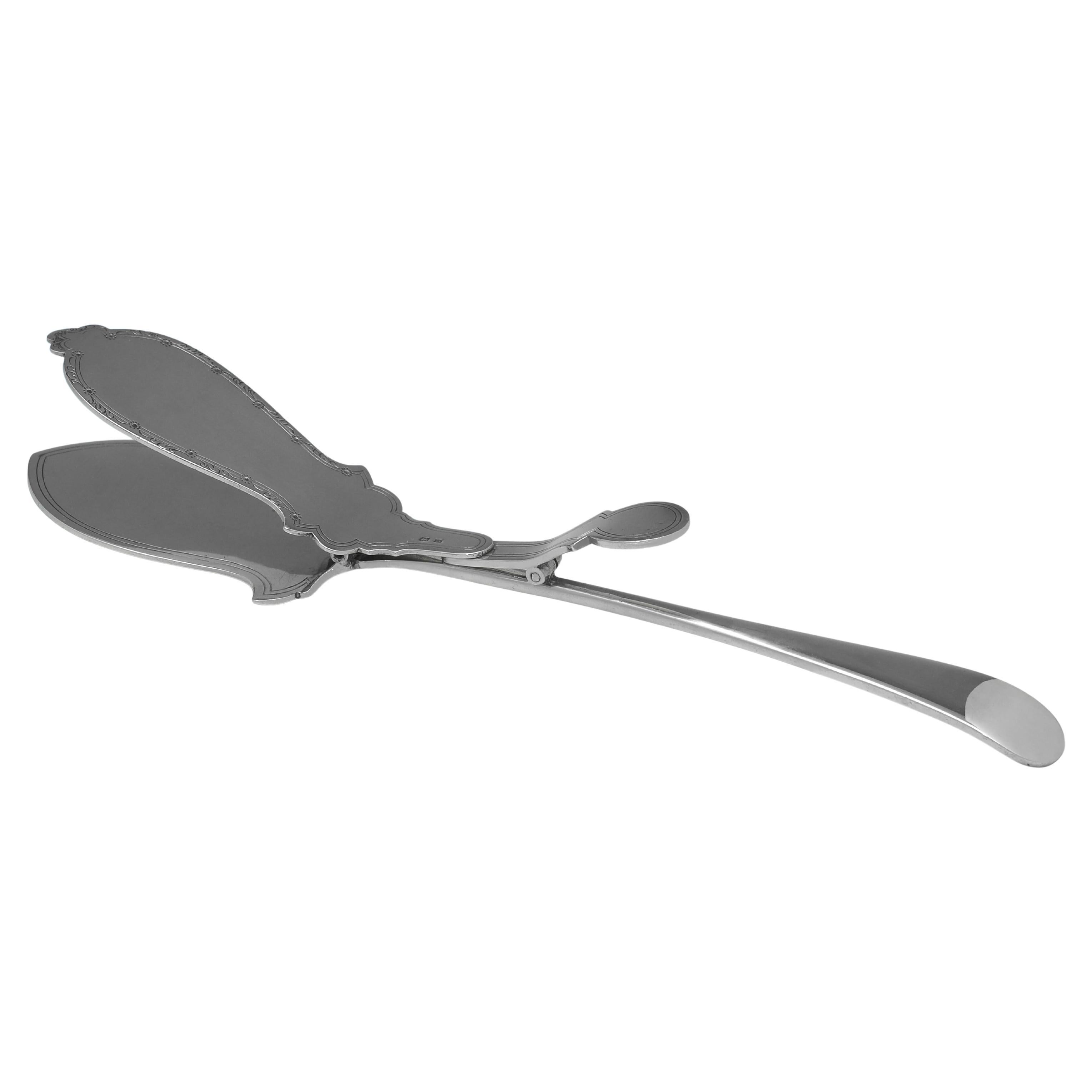 Pair of art deco sterling silver asparagus serving tongs made in 1931