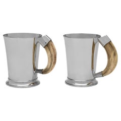 Pair of art deco sterling silver mugs with boar tusk handles made in 1937