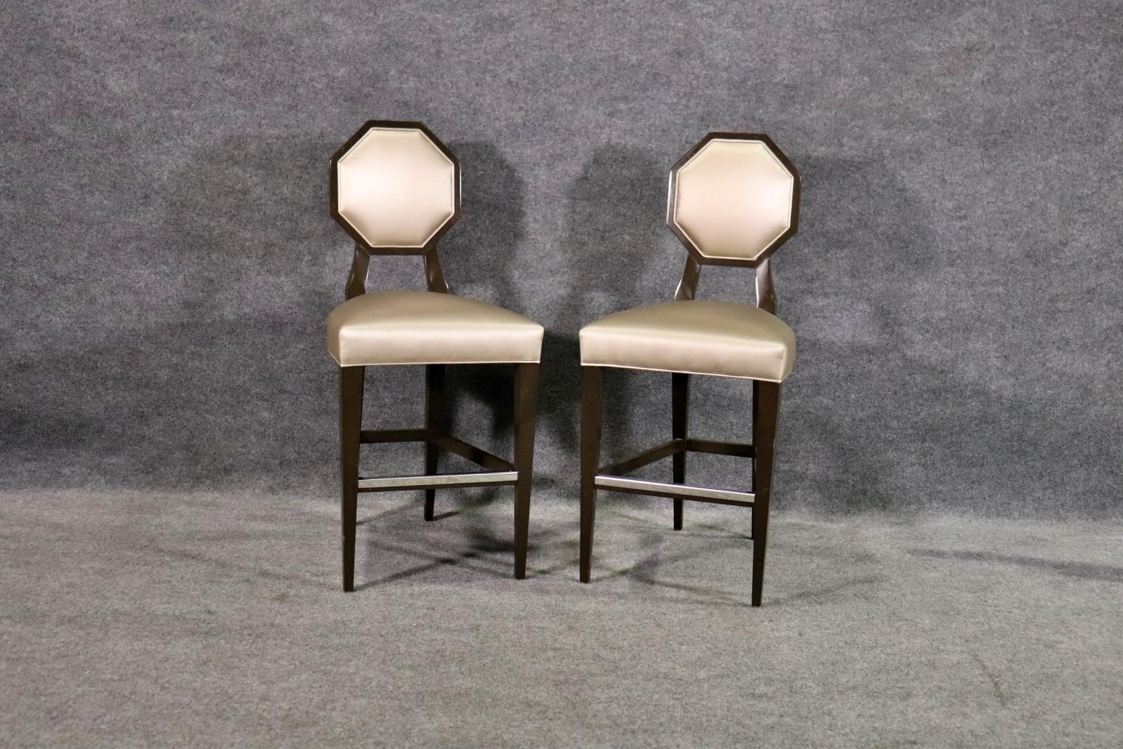 Walnut frames. Vinyl upholstery. 41
