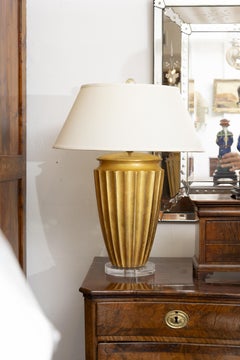 Ein Paar Tischlampen im Art-Déco-Stil aus vergoldetem Holz (Preise pro Stück)