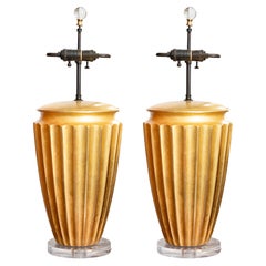 Ein Paar Tischlampen im Art-Déco-Stil aus vergoldetem Holz (Preise pro Stück)