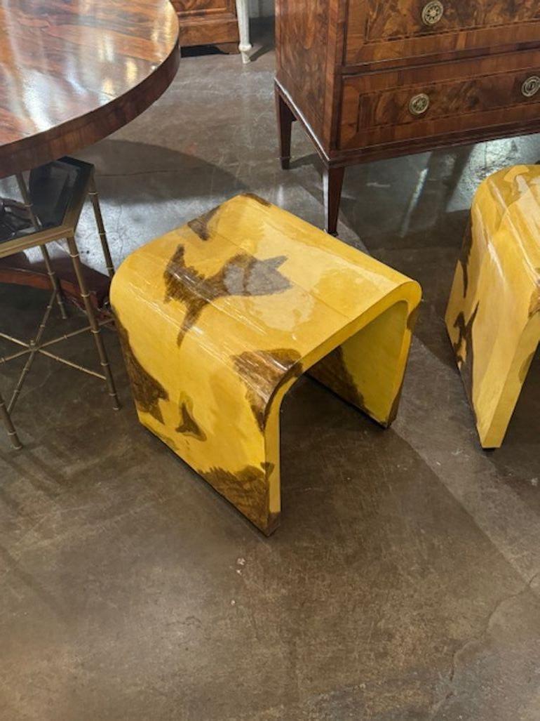 Beautiful pair of elegant Italian parchment side tables with an Art Deco style. Perfect for those looking to add a touch of sophistication to their living space, these tables are sure to make a statement in any room. The intricate patterns and