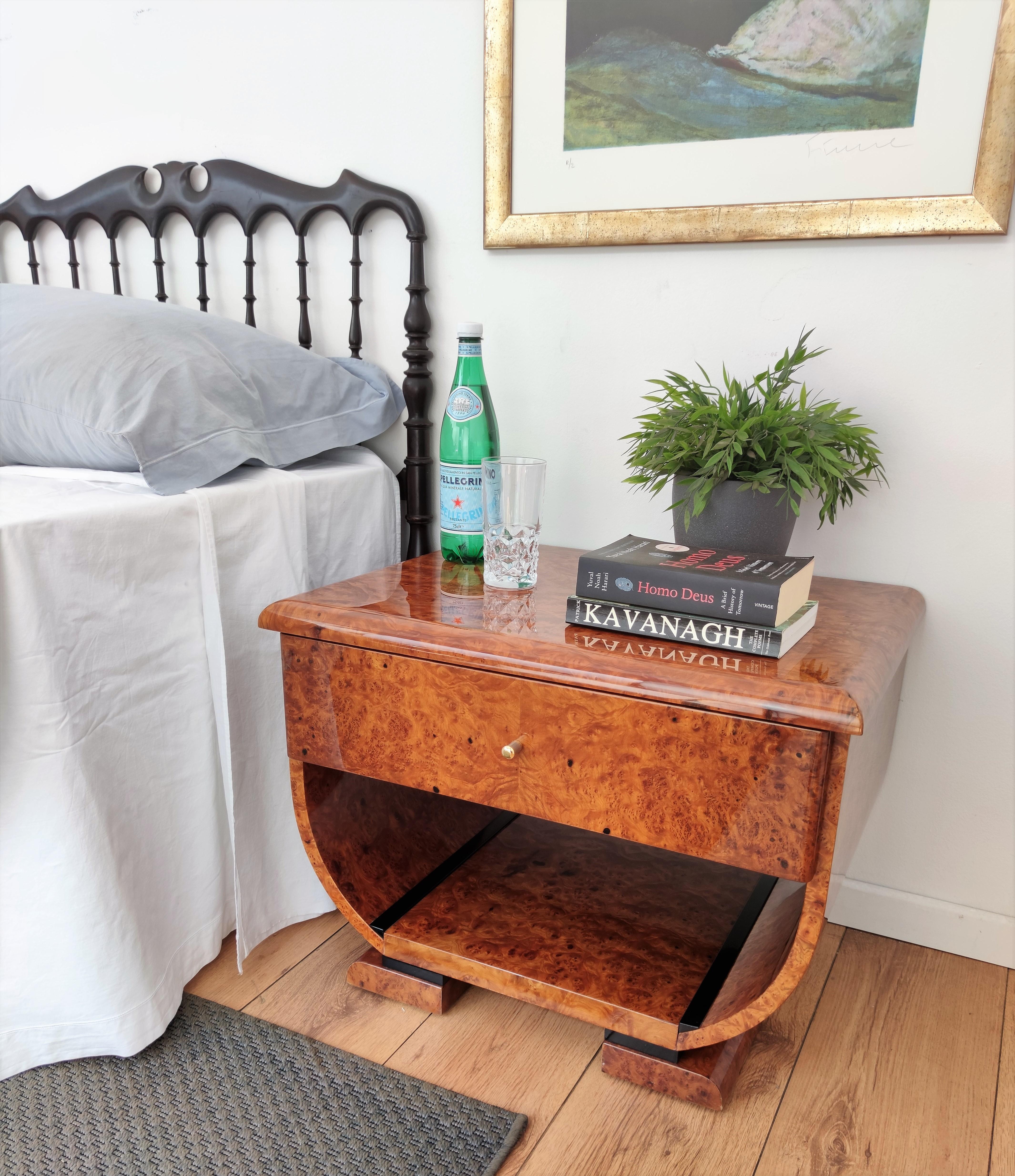 Very elegant pair of Italian late XXth century Art deco inspired style nightstands, in beautiful veneer walnut briar burl wood, central drawer and brass handles. The Art Deco style was all about making a big statement and was considered very