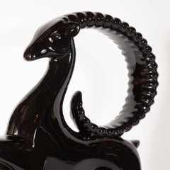 Pair of Art Deco Style Lustrous Black Ceramic Glazed Leaping Ibis Sculptures
