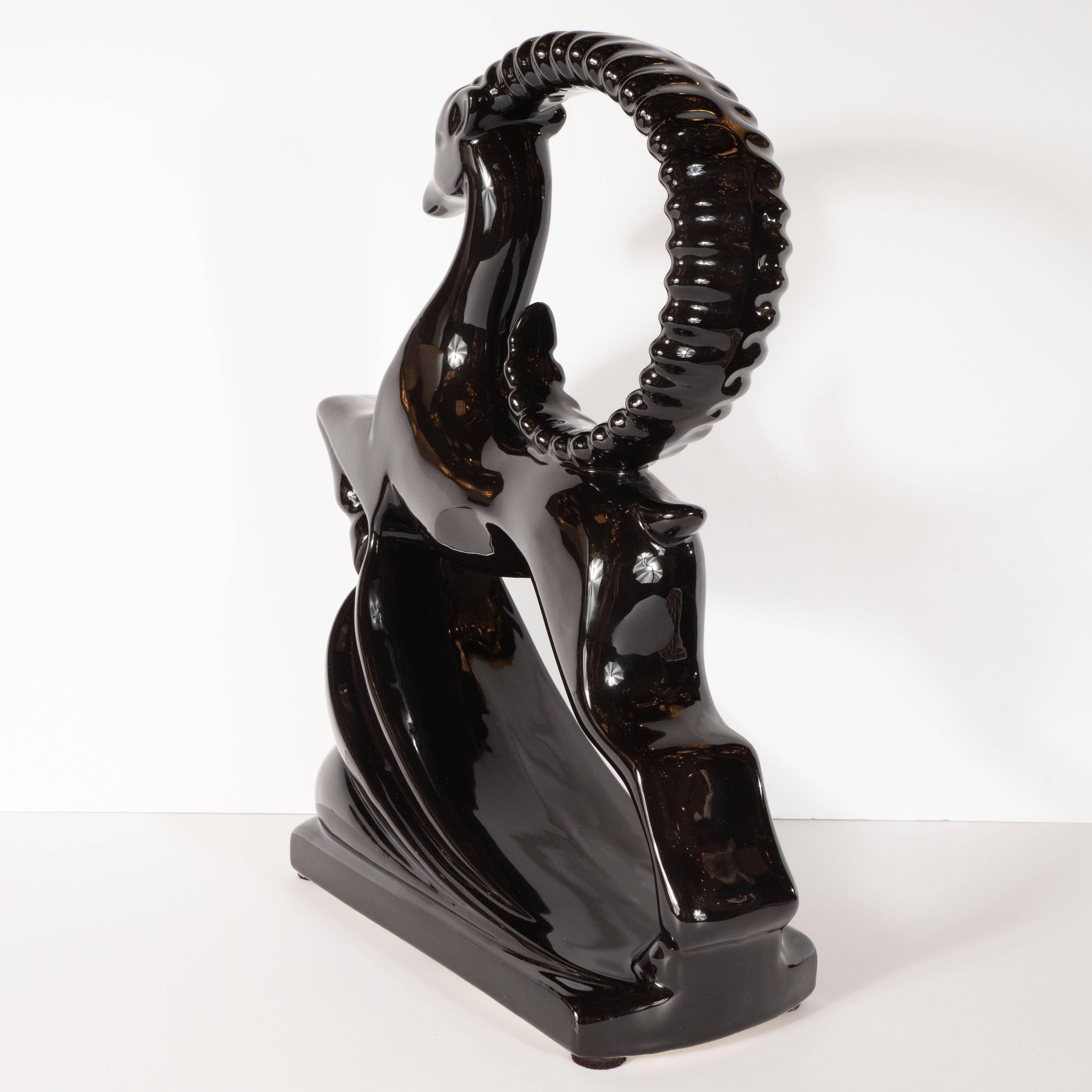 Pair of Art Deco Style Lustrous Black Ceramic Glazed Leaping Ibis Sculptures 1