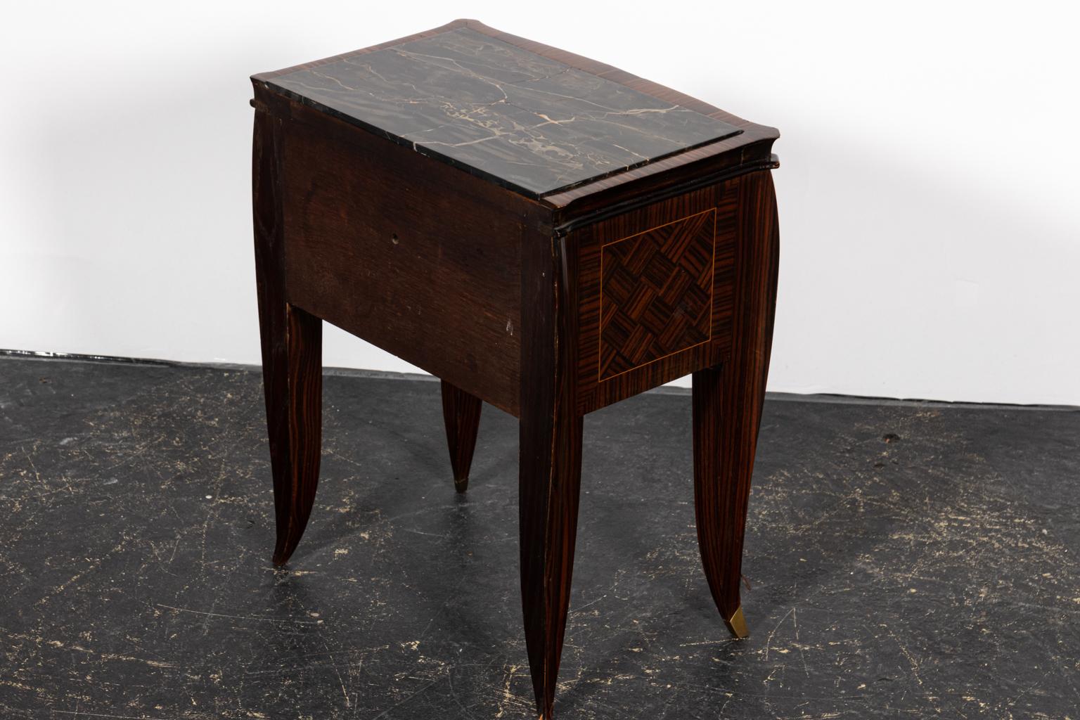 Pair of Art Deco style nightstands with a single drawer. The piece also features diamond shaped detail on the drawer front. Please note of wear consistent with age including chips and minor finish loss.