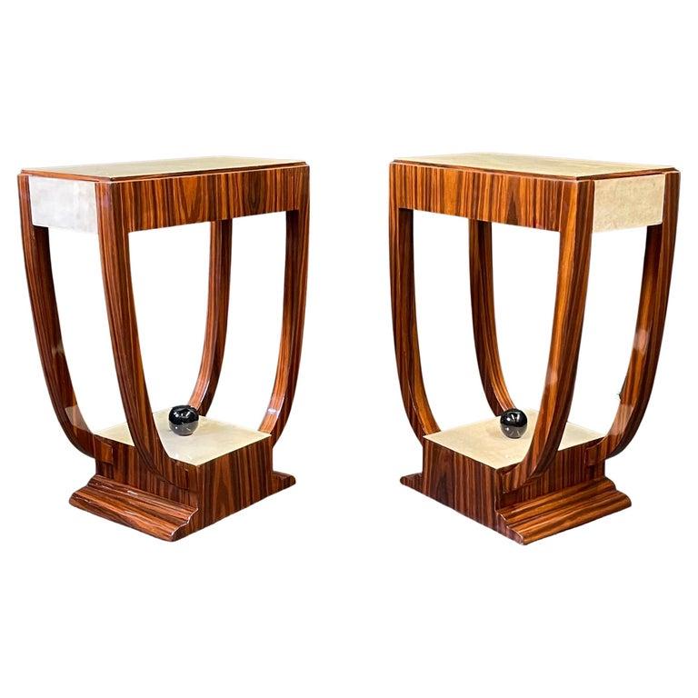 Fabulous pair of elegant and sleek Italian side tables designed by Luca Polato and inspired by the Art Deco period. Constructed of fir wood, they are beautifully veneered in a striking combination of rosewood and parchment. The bottom shelf is