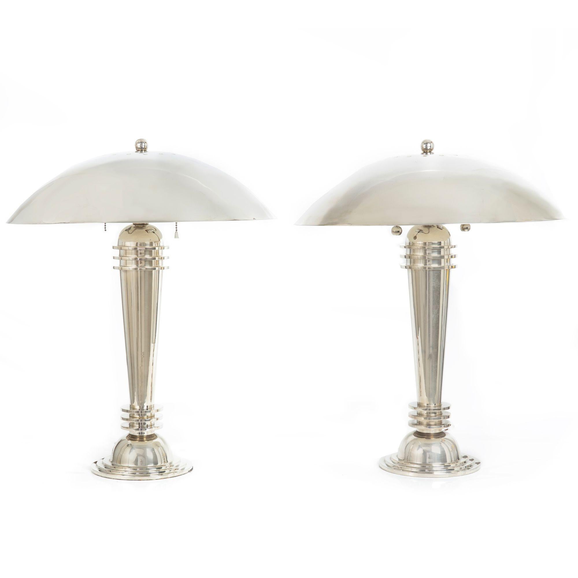 PAIR OF CHROMED TABLE LAMPS IN THE ART DECO TASTE
Unmarked, circa late 20th century based on the 1925 American design
Item # 402TPI08P

A stunning pair of chromed table lamps in the Streamline Moderne style that was born in the Art Deco period, they