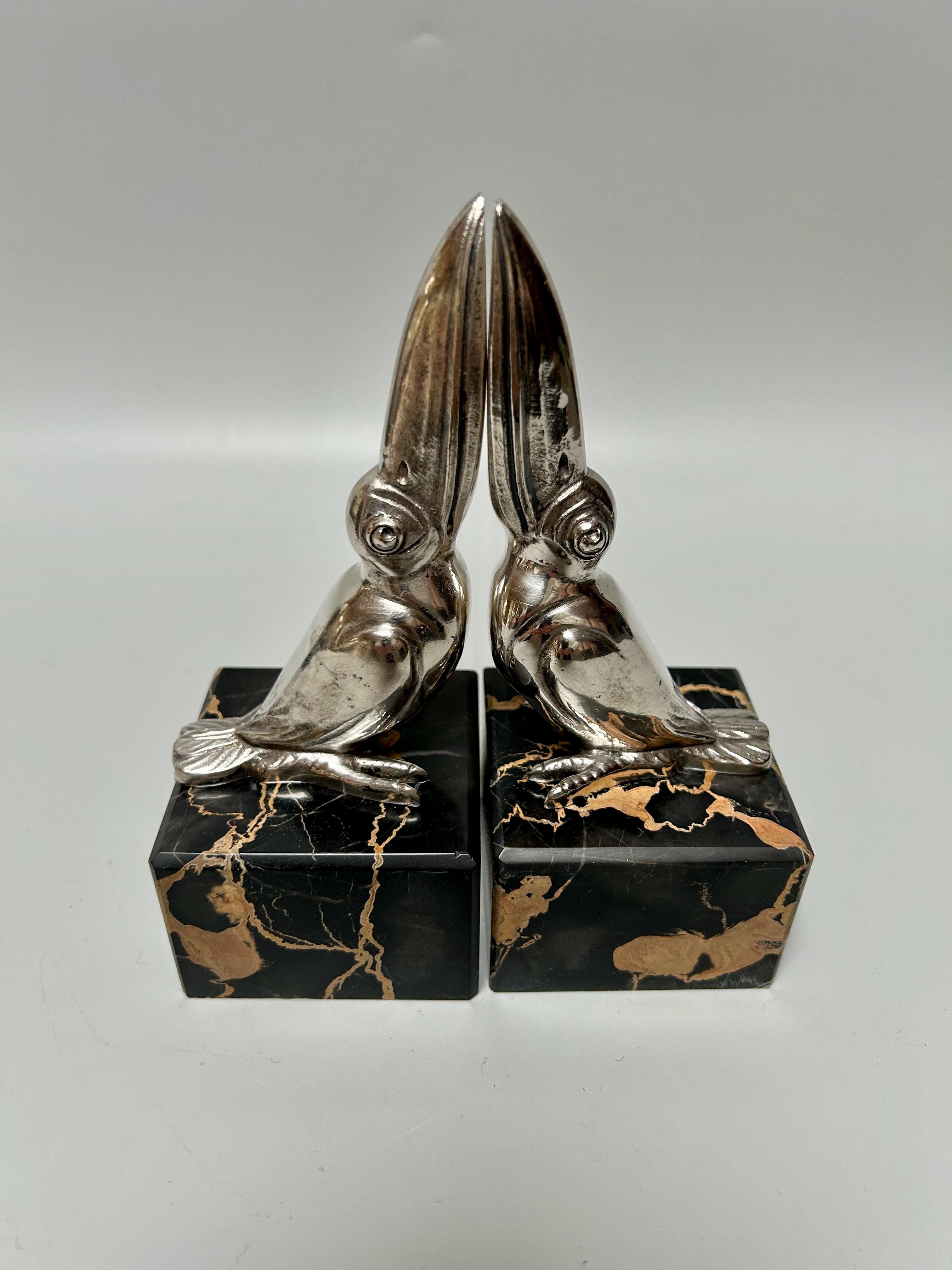 Pair of Art Deco Toucan bookends Signed M. Bertin 1