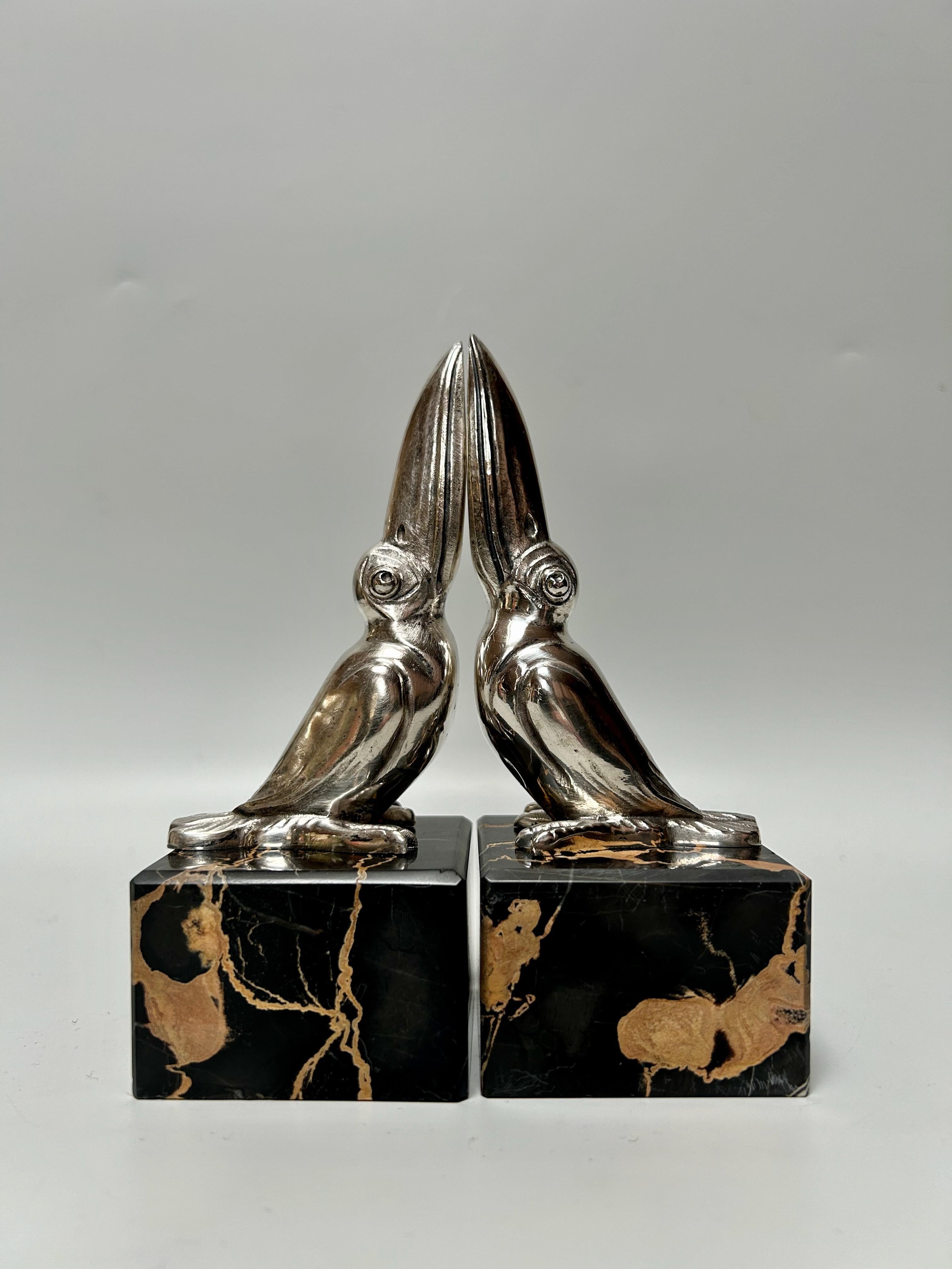 Pair of Art Deco Toucan bookends Signed M. Bertin 2