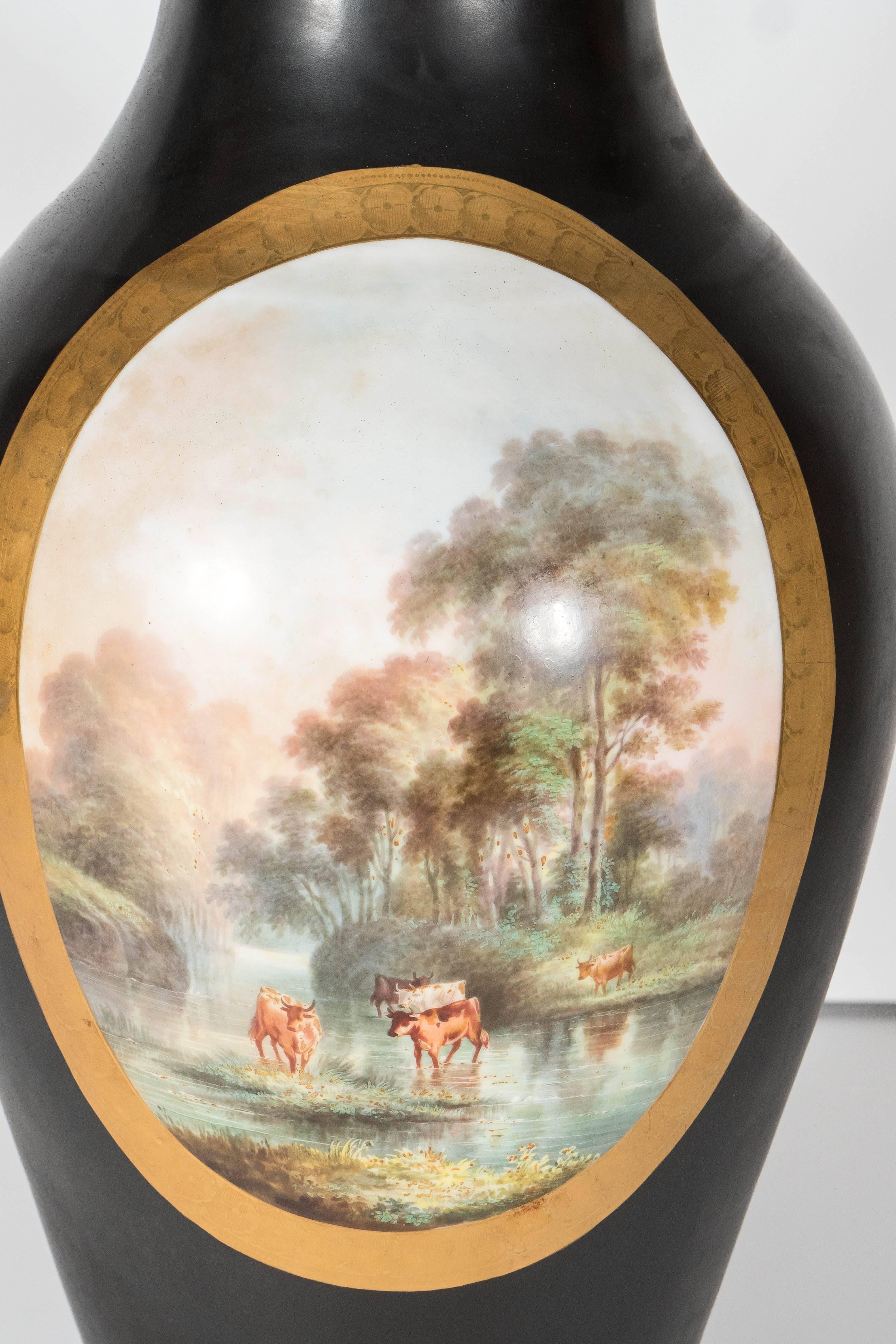 Baroque Revival Pair of Art Deco Urn Form Black Bisque Glaze Table Lamps with Pastoral Scene