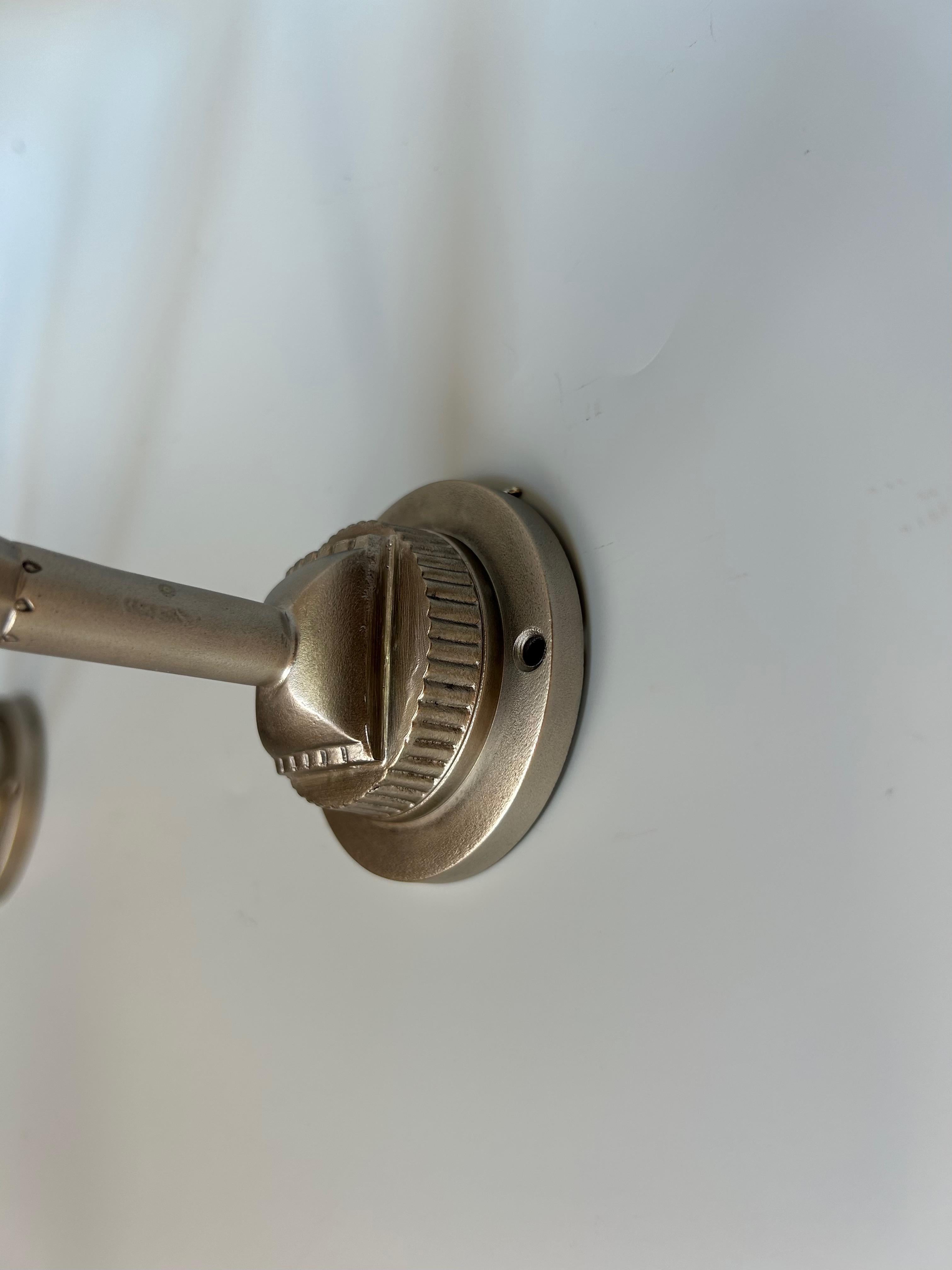 Bronze Pair of Art Deco wall lights For Sale