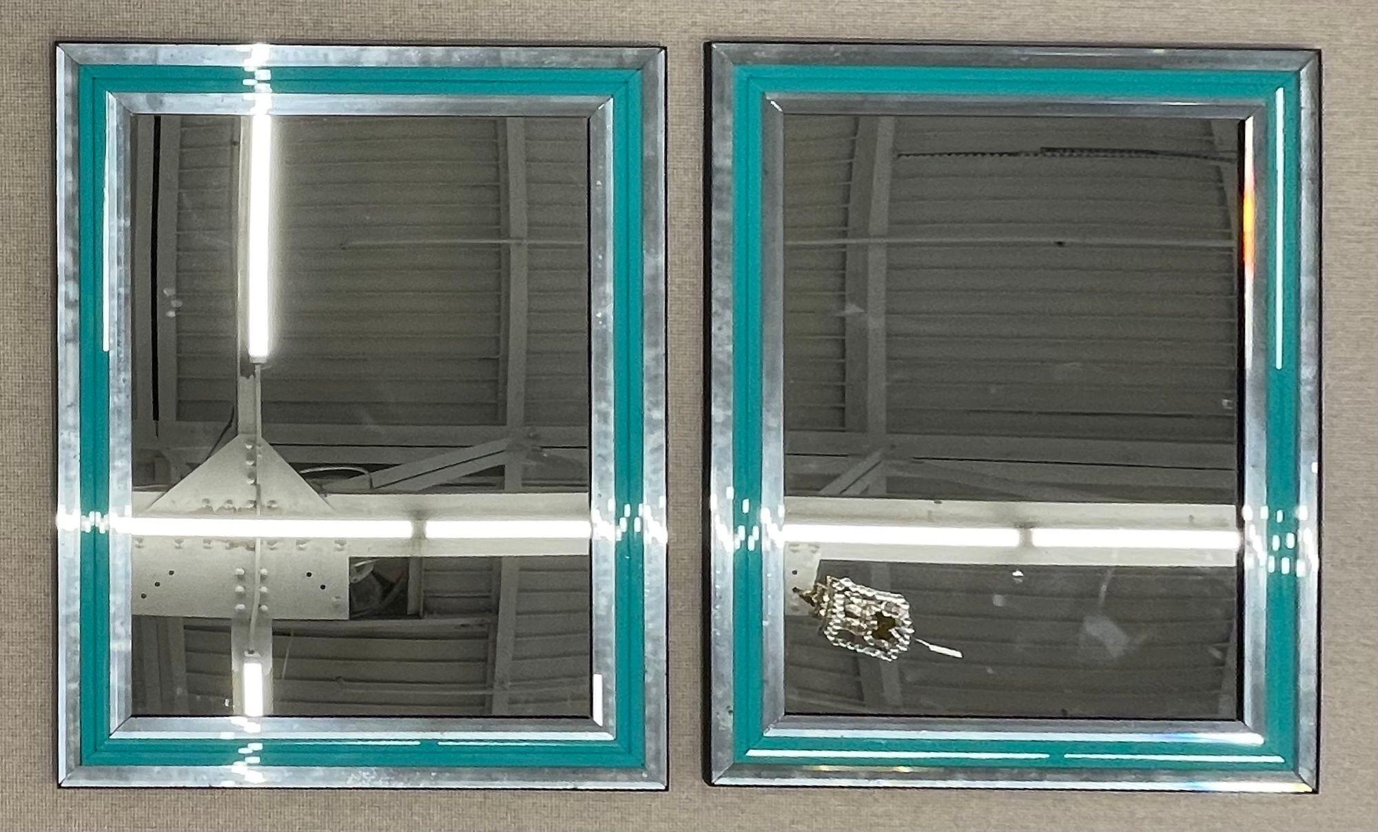 Pair of Art Deco Wall, Mantle, Console or Pier Mirrors with Turquoise Beveled Frames inside Clean Mirrored Beveled Panels.
 
A pair of large and impressive stunning monumental Art Deco style wall, console or pier mirrors with beveled frames. Each
