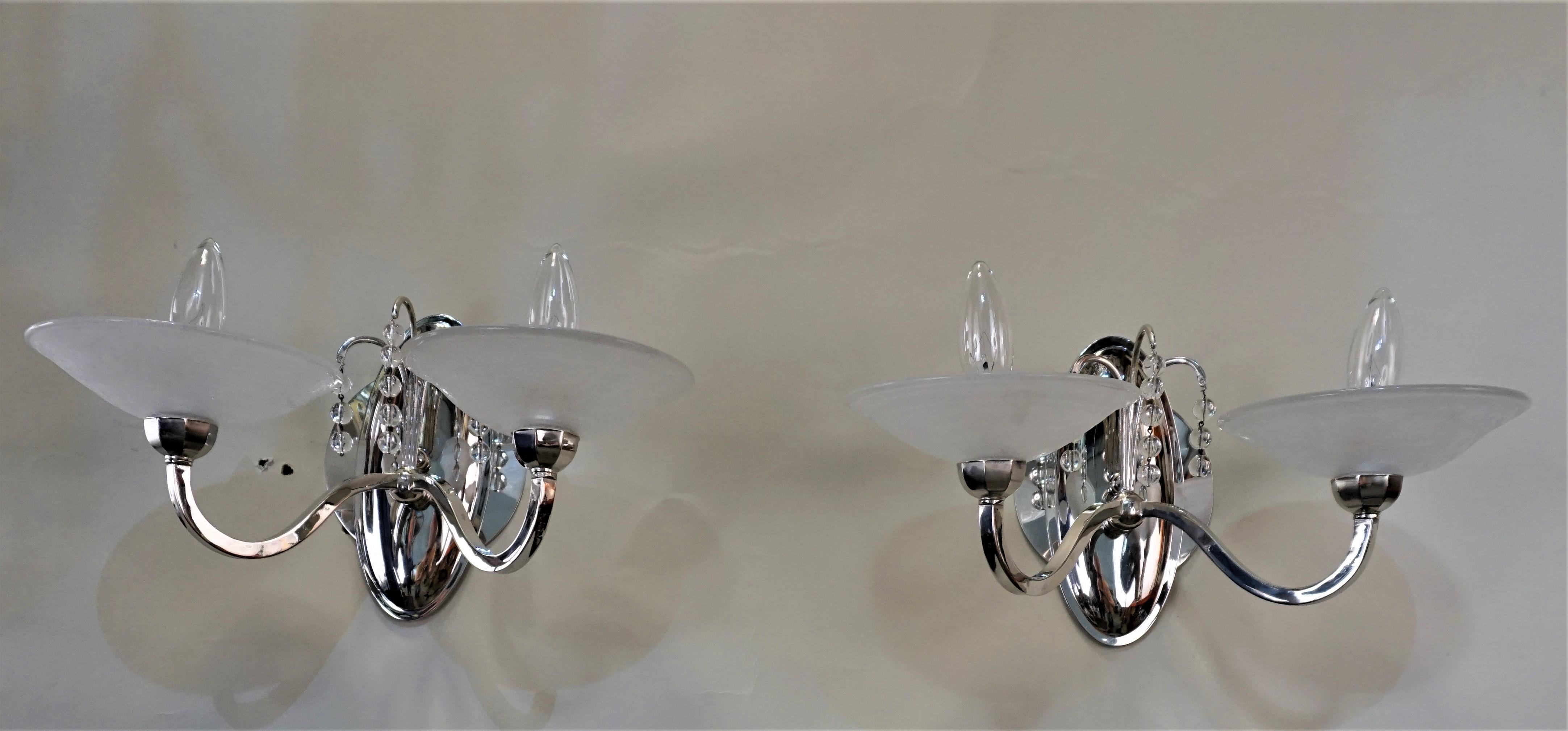 Pair of double light nickel on bronze and acid textured glass shade wall sconces by Muller Freres.