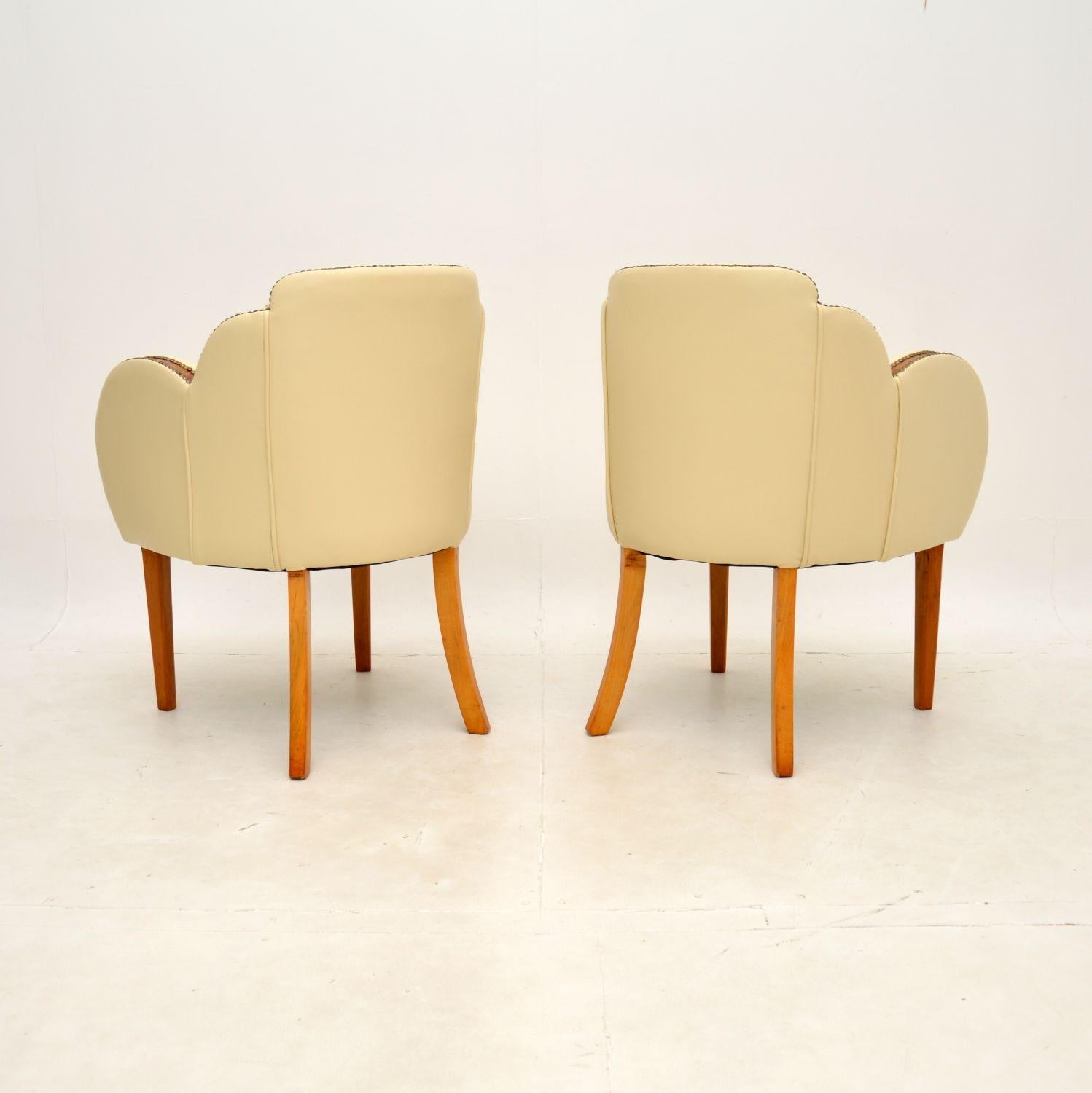 Early 20th Century Pair of Art Deco Walnut and Leather Cloud Back Armchairs by Epstein