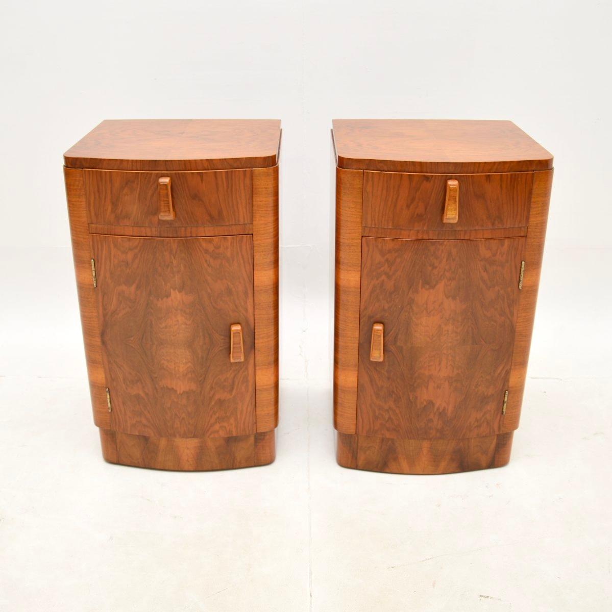 A beautifully made pair of Art Deco walnut bedside cabinets. They were made in England, they date from the 1930’s.

Made from richly figured walnut, the colour and grain patterns are lovely. They are a very useful size and offer ample storage, each