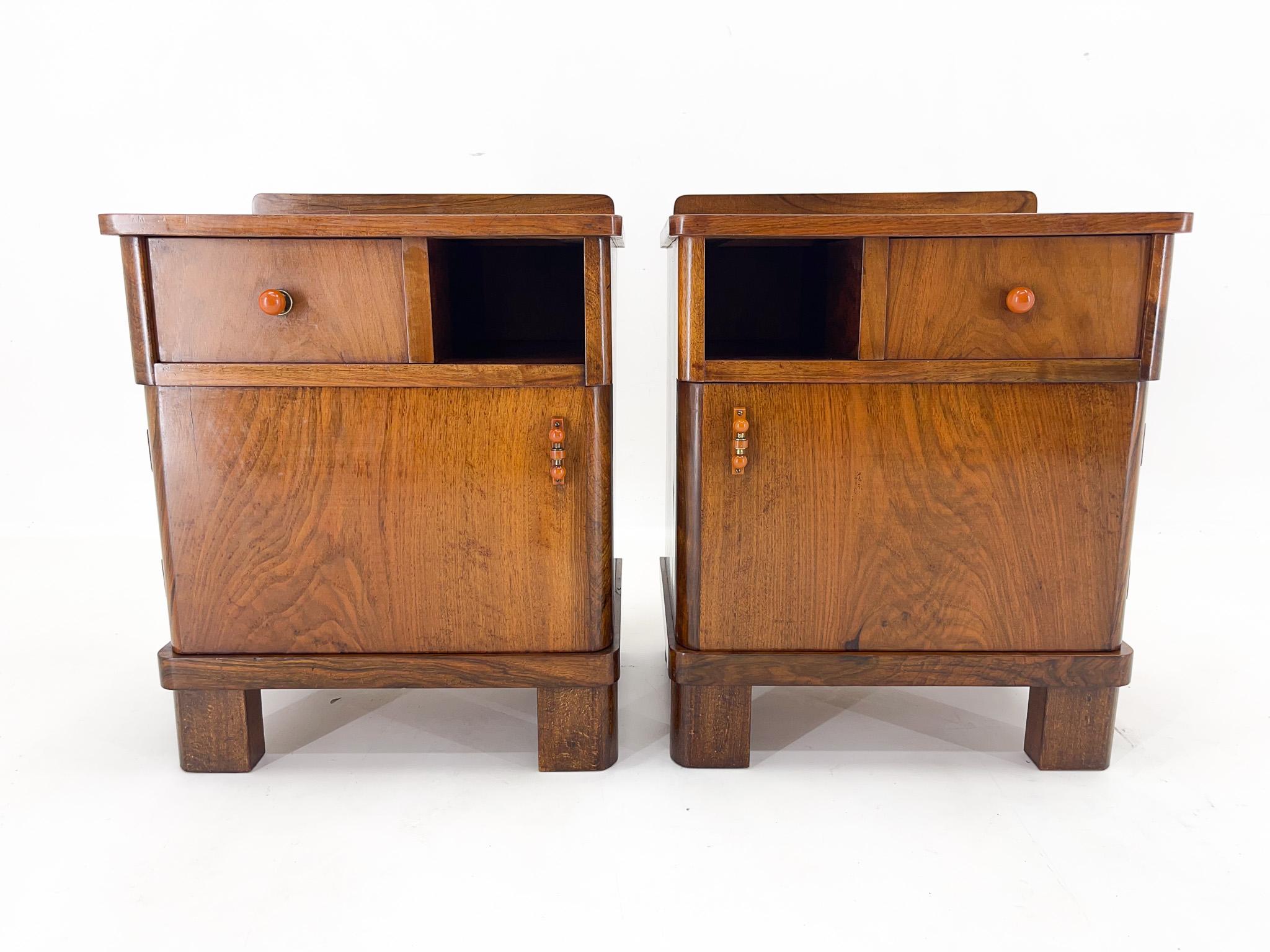 Set of two art deco night stands. Made of walnut, produced in former Czechoslovakia. Good original condition with some signs of use (see photo).