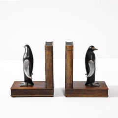 Pair of Art Deco Walnut, Black Enamel & Brass Sculptural Penguin Bookends