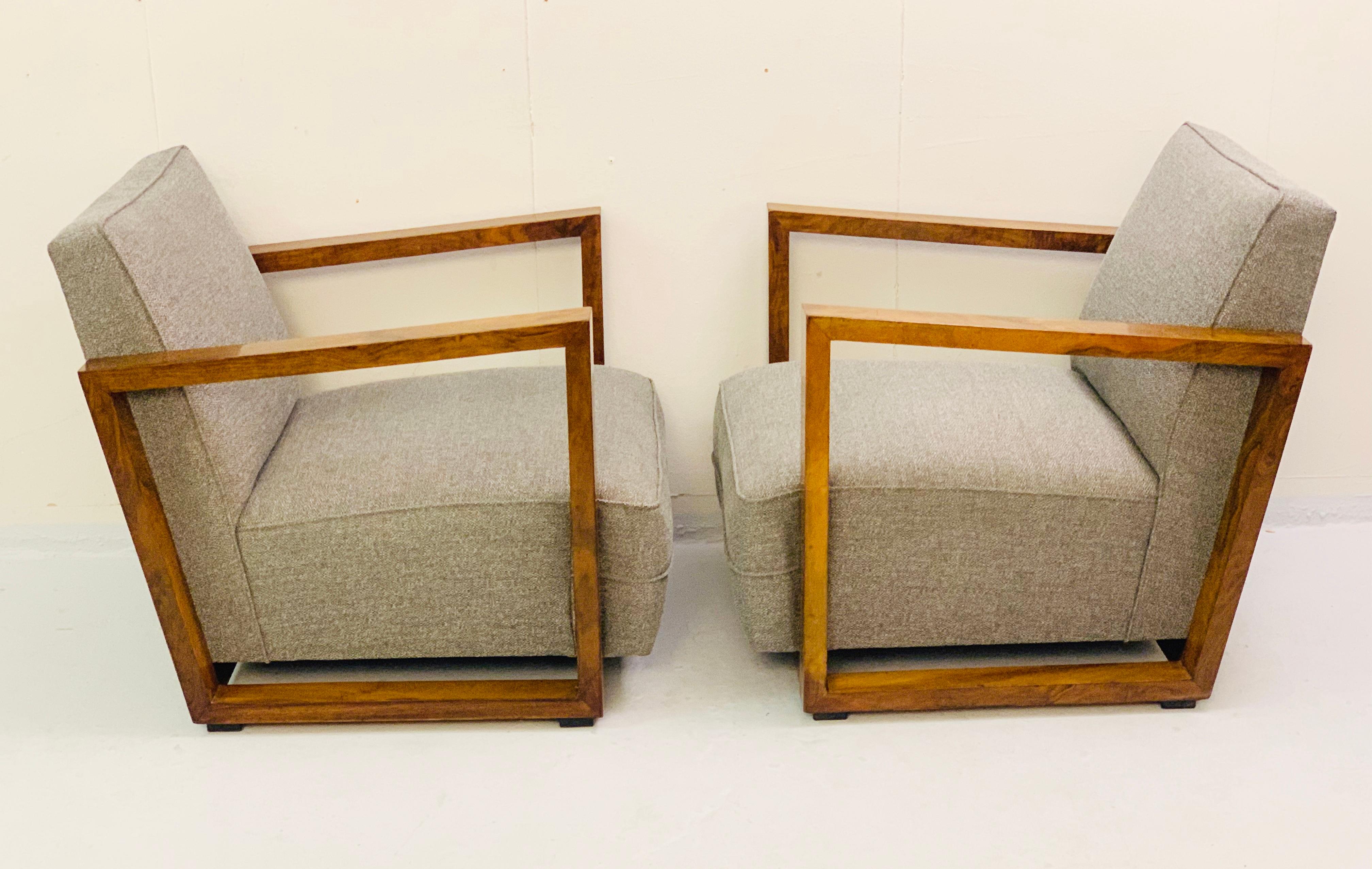 Pair of Art Deco walnut club armchairs, Austria, circa 1930.