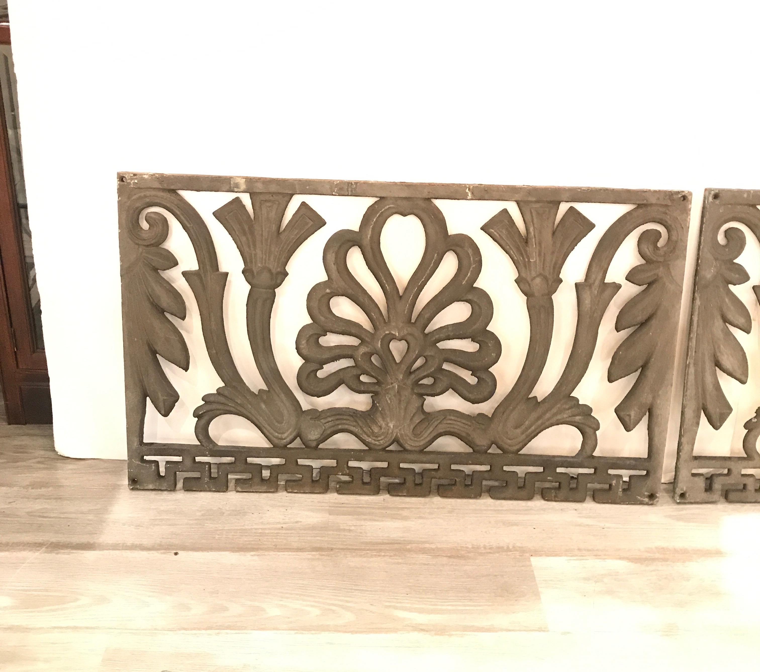 A pair of cast iron Art Nouveau architectural panels, from a railing of a Newark, NJ theater. Great detail with original ages surface. The panels are flat on the back. 

     