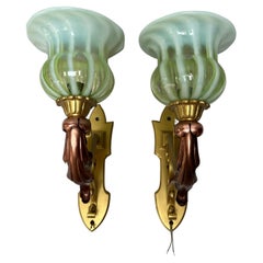 Pair of Art Nouveau bronze and copper sconces