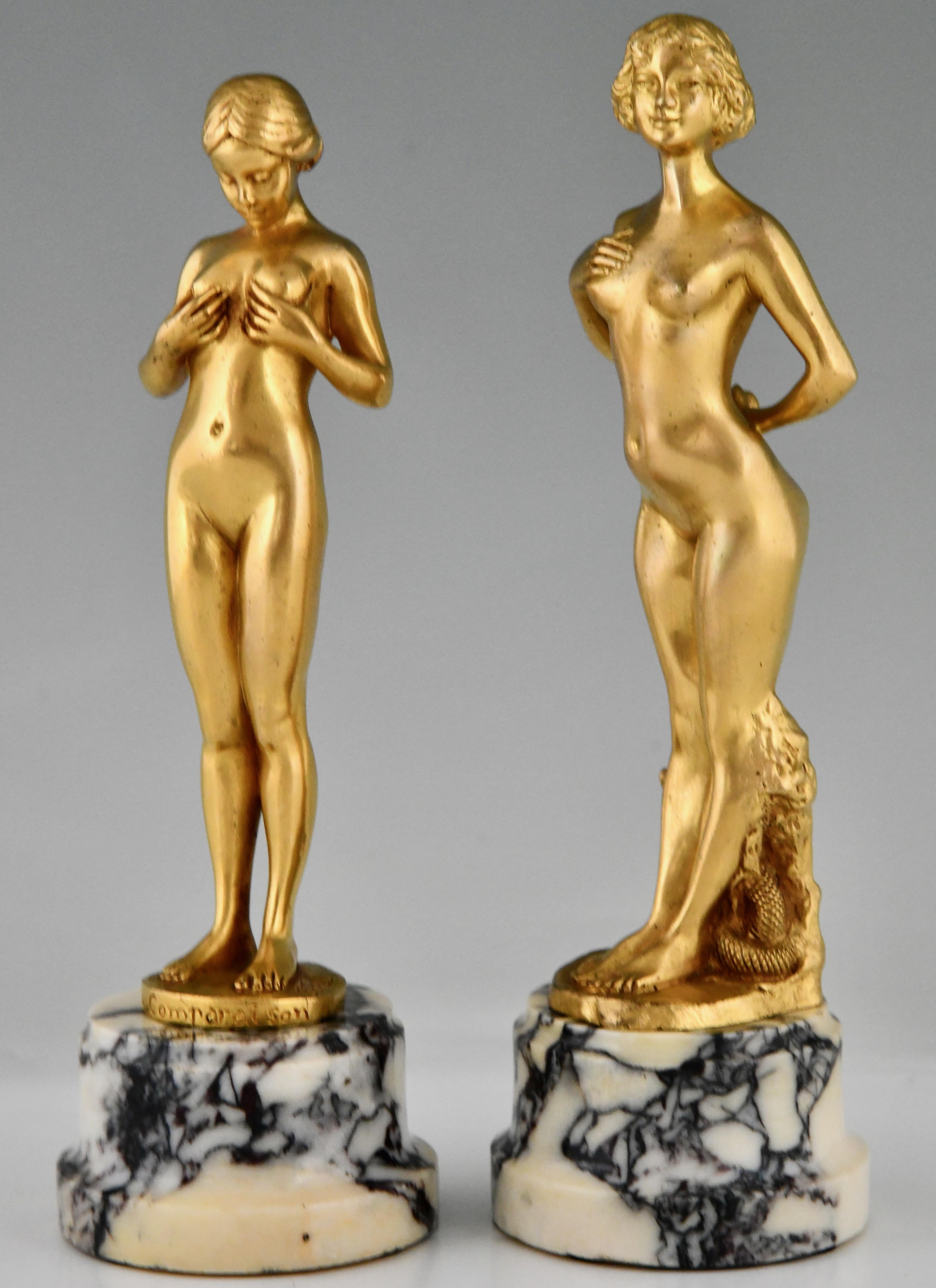 Pair of Art Nouveau bronze nude sculptures signed by Antoine Bofill, France 1905. 
Gilt bronze on marble base. 
La Comparaison, young woman comparing her breasts and Eve with apple and snake.

Literature:
Bronzes, sculptors and founders, H. Berman,