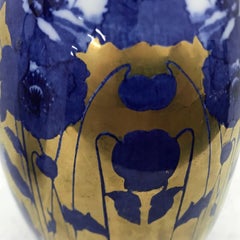 Pair of Art Nouveau English Gold Blue and White Ceramic British Jugs, circa 1900