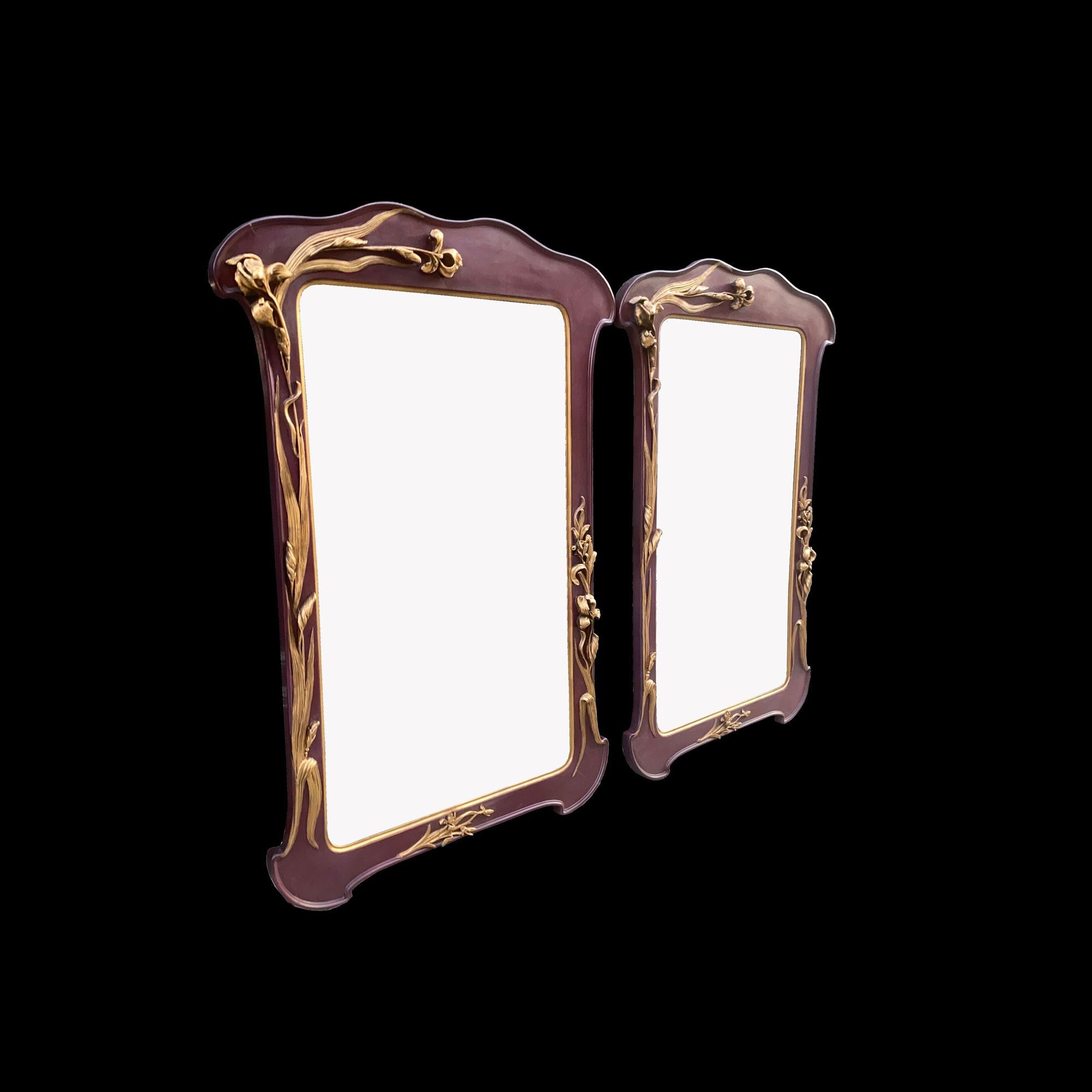 Louis Majorelle
Rare pair of Art Nouveau style stucco frames attributed to Louis Majorelle. Very beautiful golden iris pattern on a burgundy purple background. Currently in a simple frame but can be used as a mirror
production possible on request