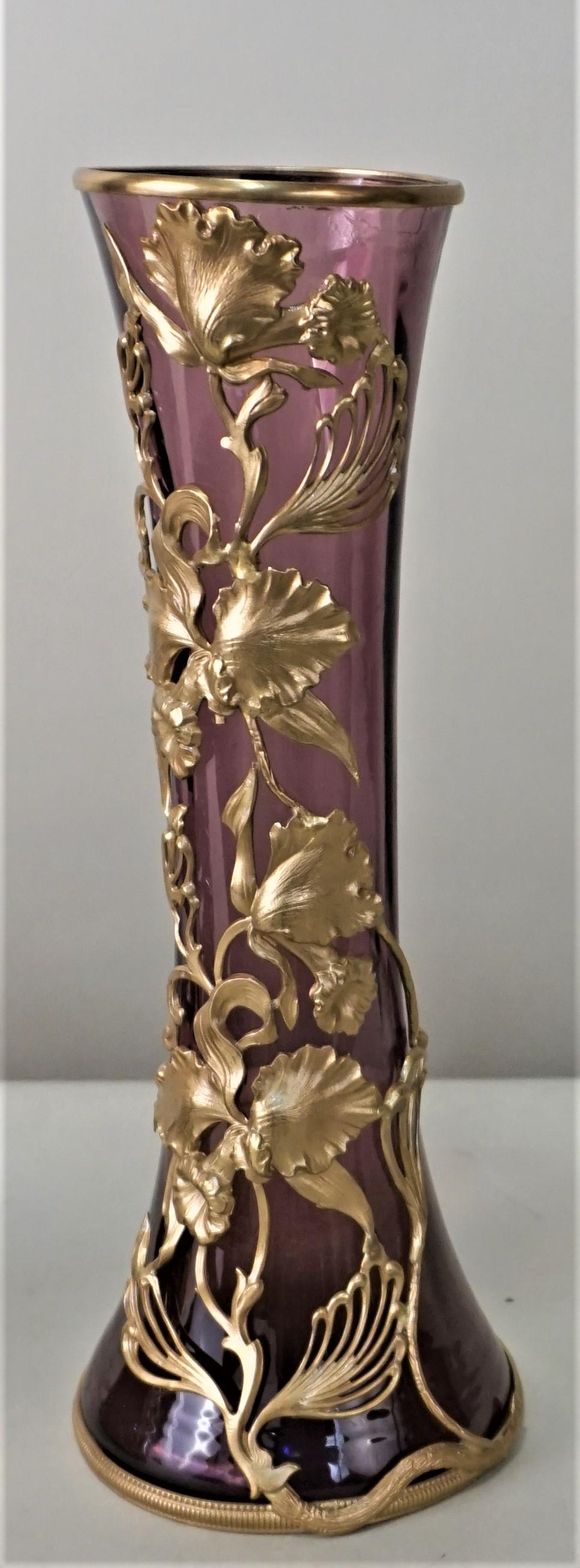 Pair of purple color glass vases with bronze overlay.