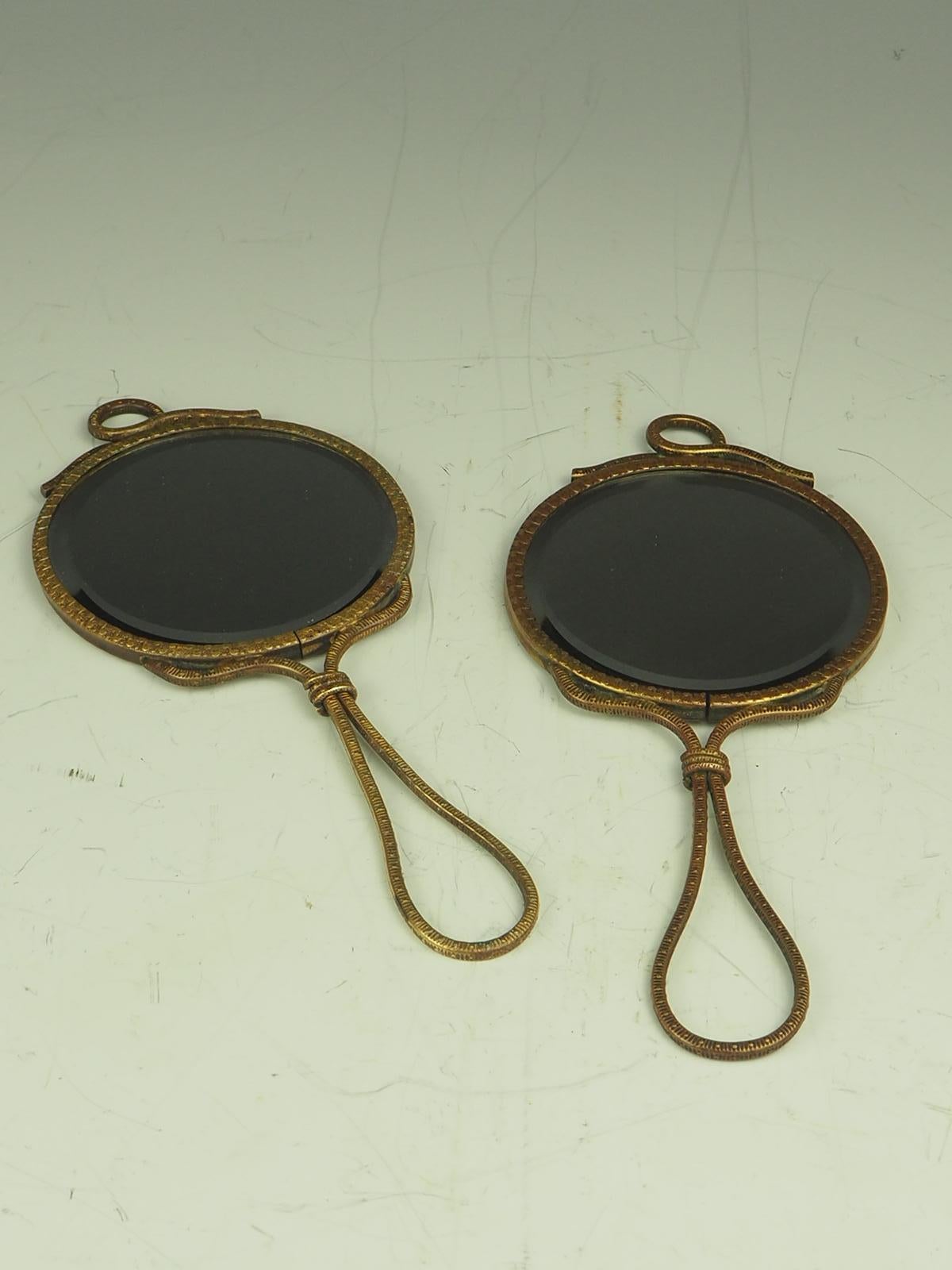 Pair of Art Nouveau Hand Held Bevelled Mirrors

Great for when your doing your hair!

Condition

Some age appropriate ware

Measurement

Height:  20  cm   

Width:   9 cm   