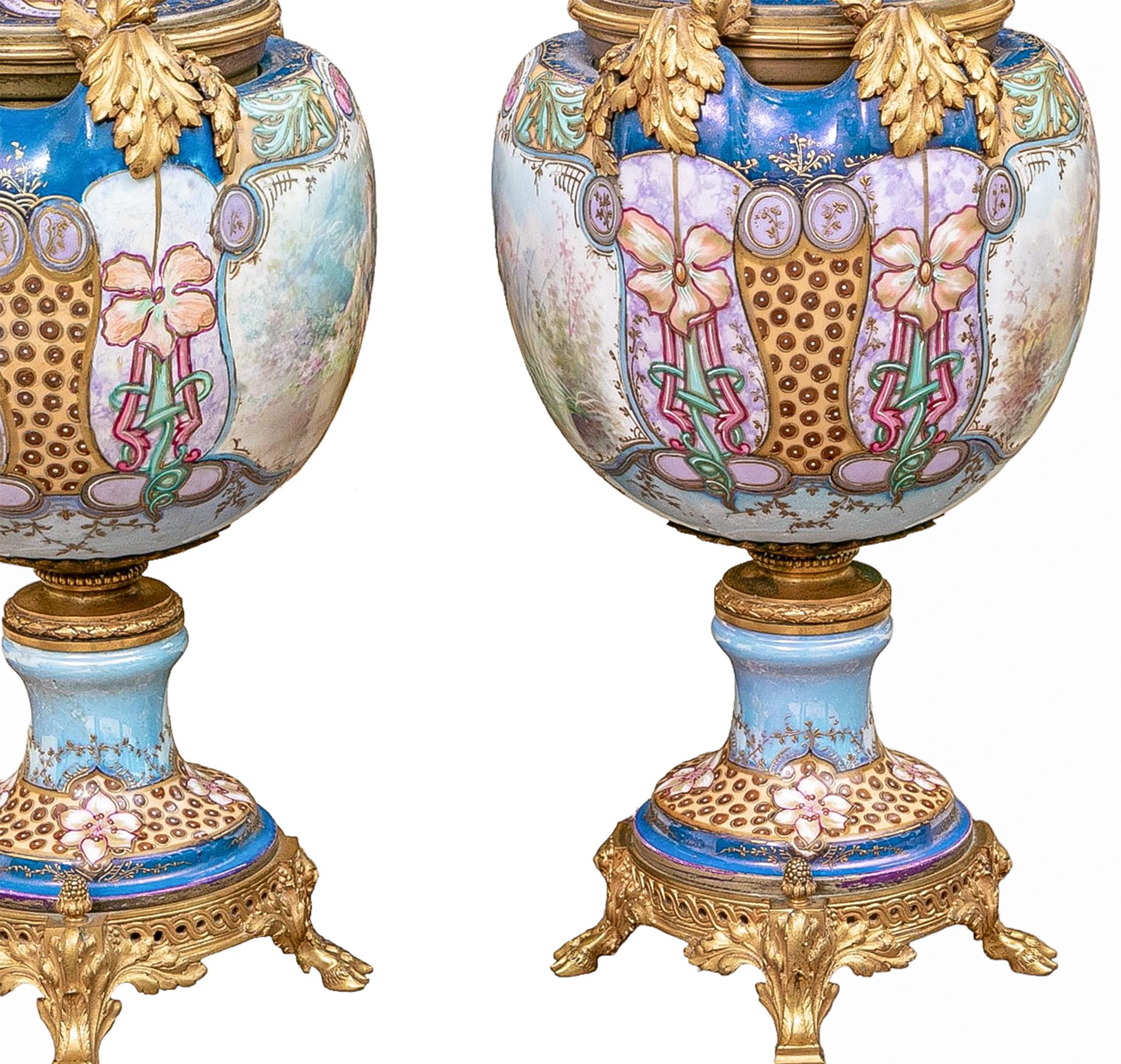 Hand-Painted  PAIR OF ART NOUVEAU INSPIRED ORMULU MOUNTED PORCELAIN URNS SIGNED by COLLOT