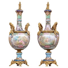 PAIR OF ART NOUVEAU INSPIRED ORMULU MOUNTED PORCELAIN URNS SIGNED by COLLOT