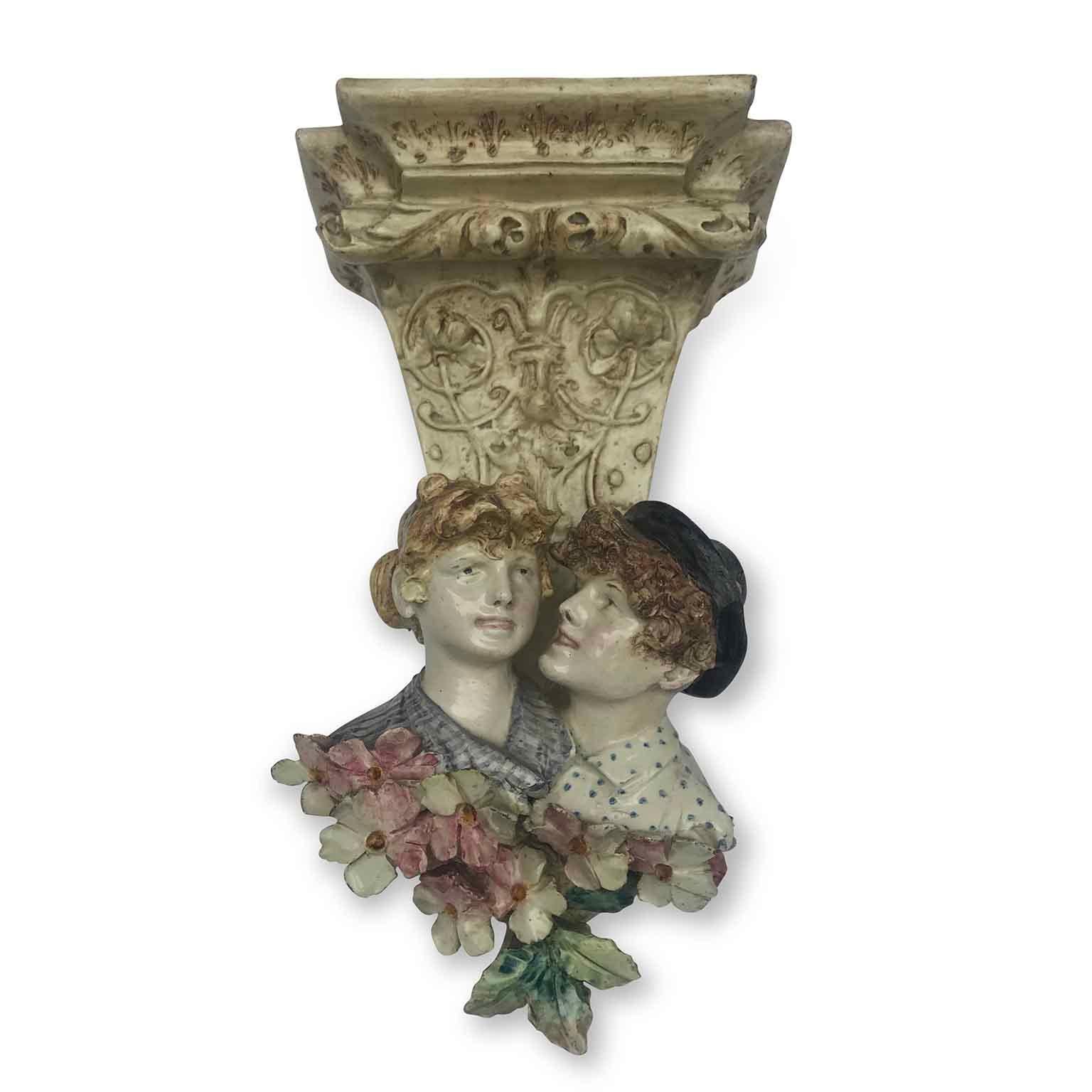 Ceramic Art Nouveau Italian Pair of Wall Brackets with Children Busts and Flowers 1920 For Sale