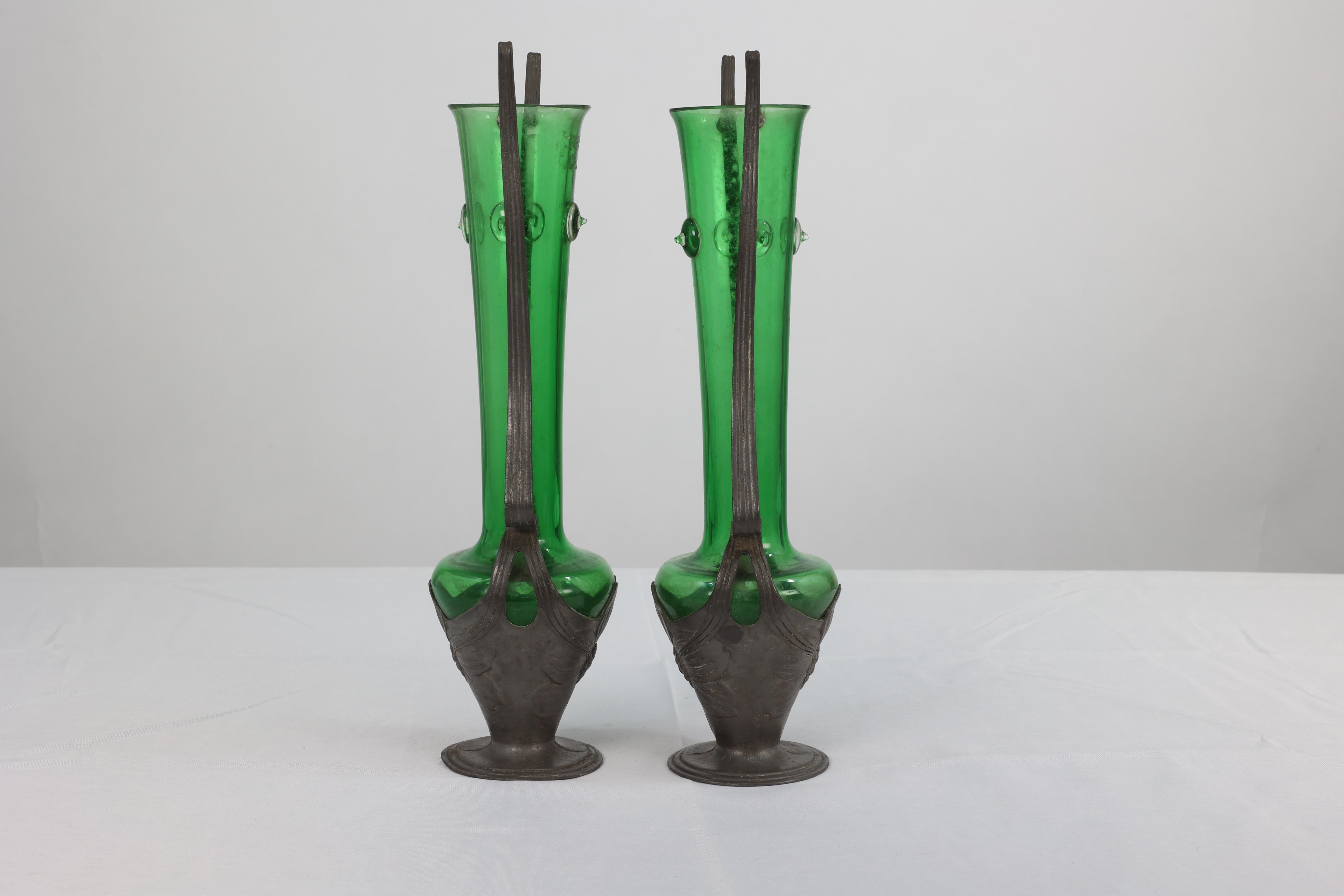Osiris, a pair of Art Nouveau pewter and green glass twin-handled vases, stamped 'Osiris 518 Isis.'