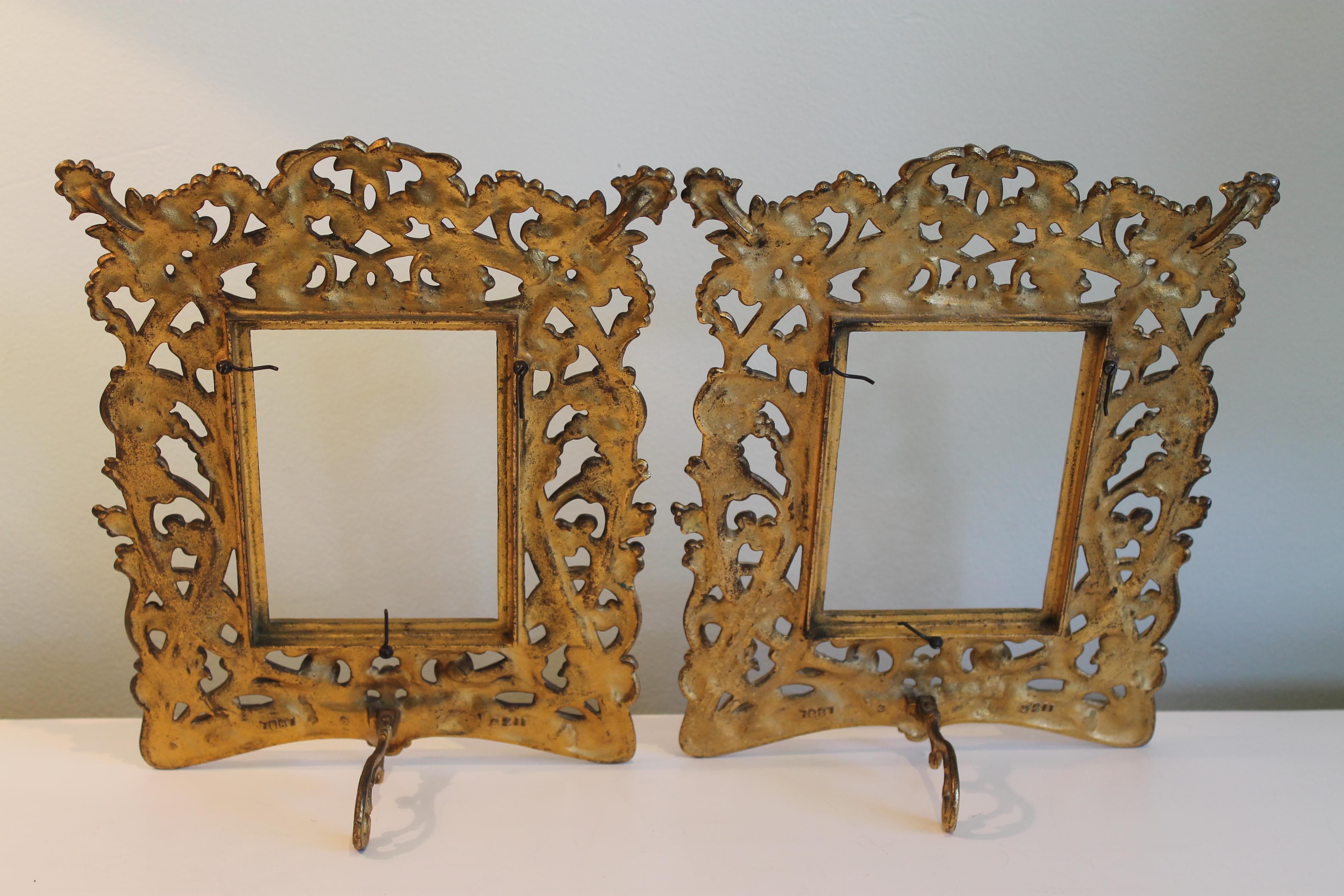 Pair of Art Nouveau picture frames. There's a slight difference in coloration as seen in the photos. They measure 9.5