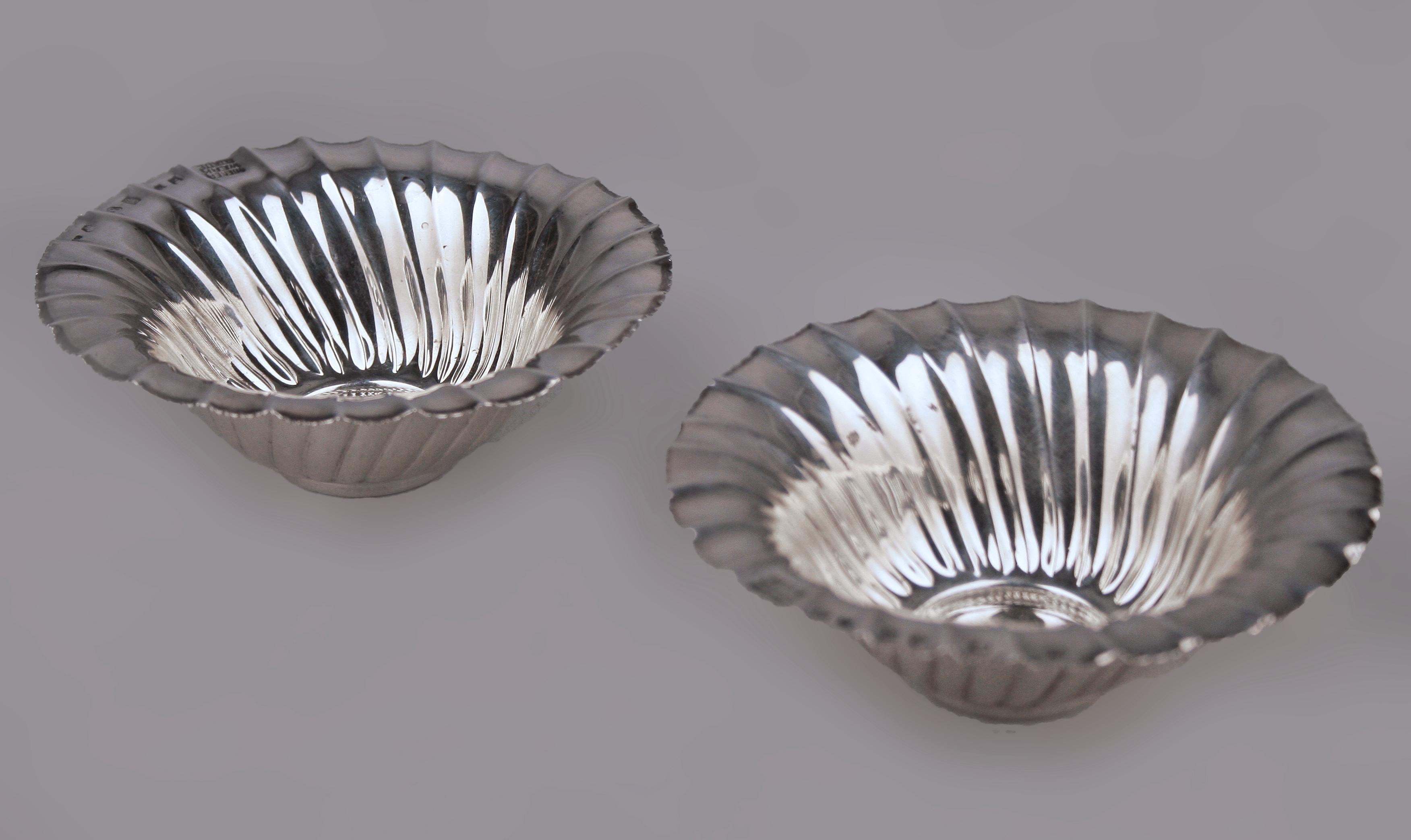 Pair of Art Nouveau polished silver bowls by Josef Hoffmann for Wiener Werkstätte

By: Josef Hoffmann, Wiener Werkstätte
Material: silver, silverplate, metal
Technique: embossed, plated, silvered, polished, metalwork
Dimensions: 4.5 in x 1.5
