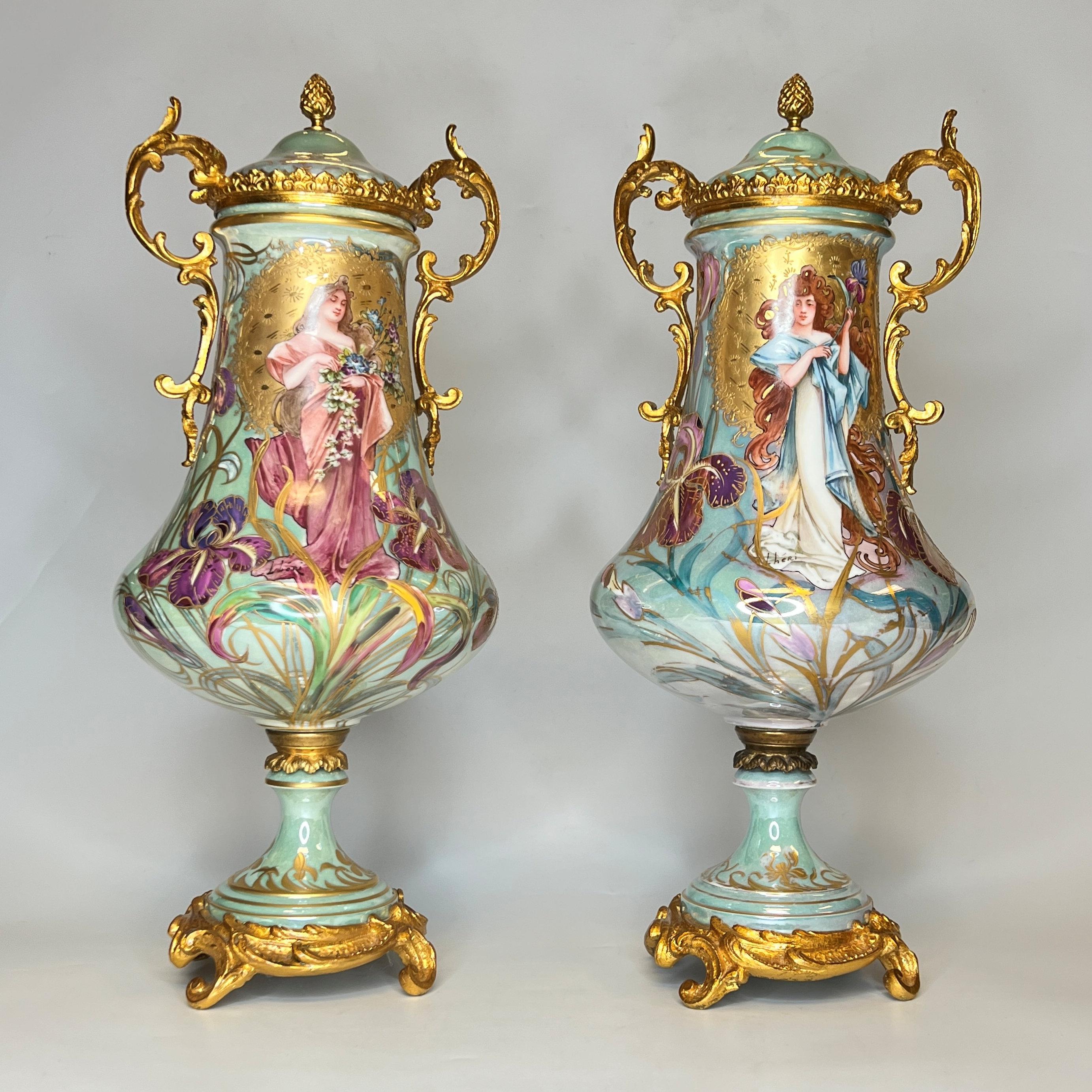 Pair of French 19th century Art Nouveau Sevres style Iridescent Porcelain vases & covers painted by Lheri.