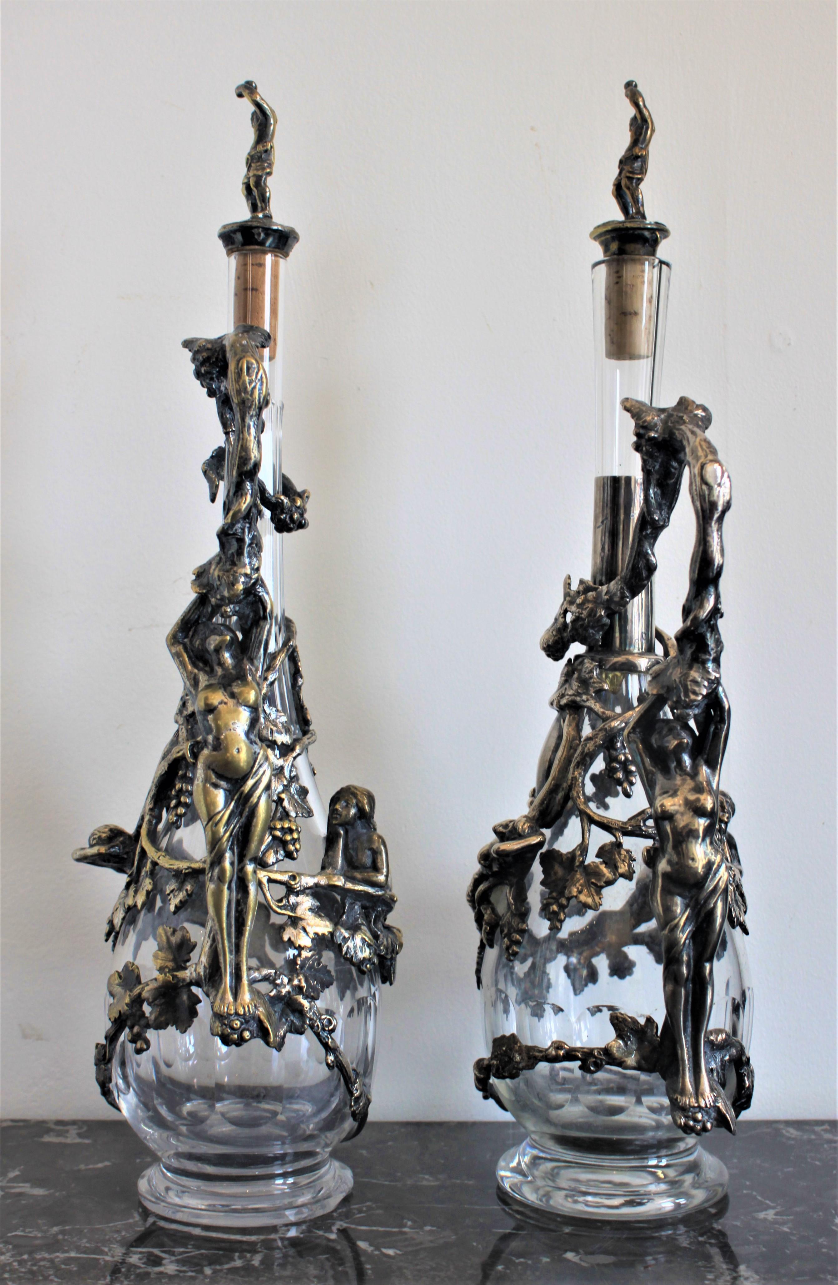 20th Century Pair of Art Nouveau Silver Plated Decanters with Nude Female & Vine Decoration For Sale