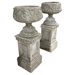 Pair of Art Nouveau Style Concrete Urns On Plinths