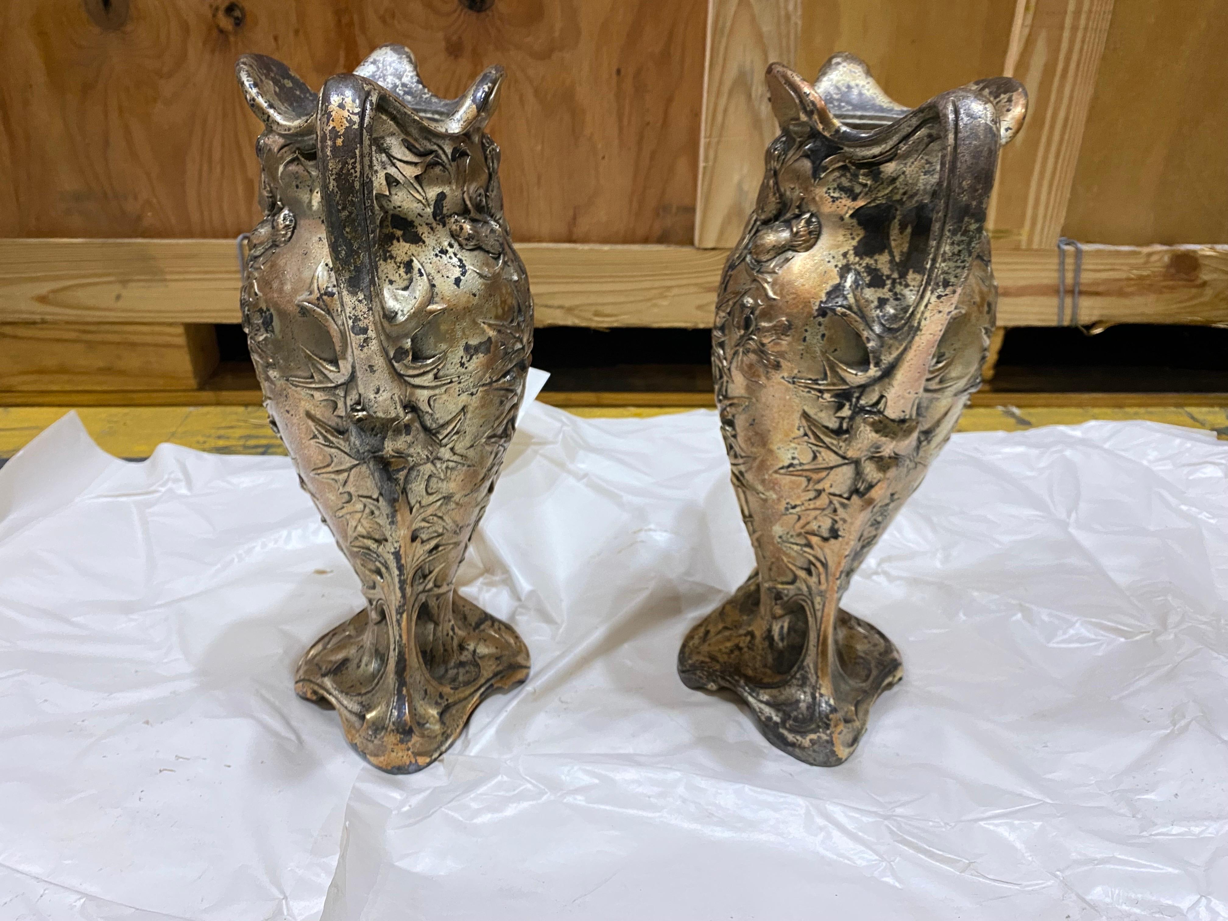 Pair of Art Nouveau Vases Iron Forged, by Dagobert Peche from the Collection of Pierre Cardin.

An exquisite pair of classic Art Nouveau vases made in forged iron and silver painted, as was the style at the time, by Dagobert Peche, an Austrian