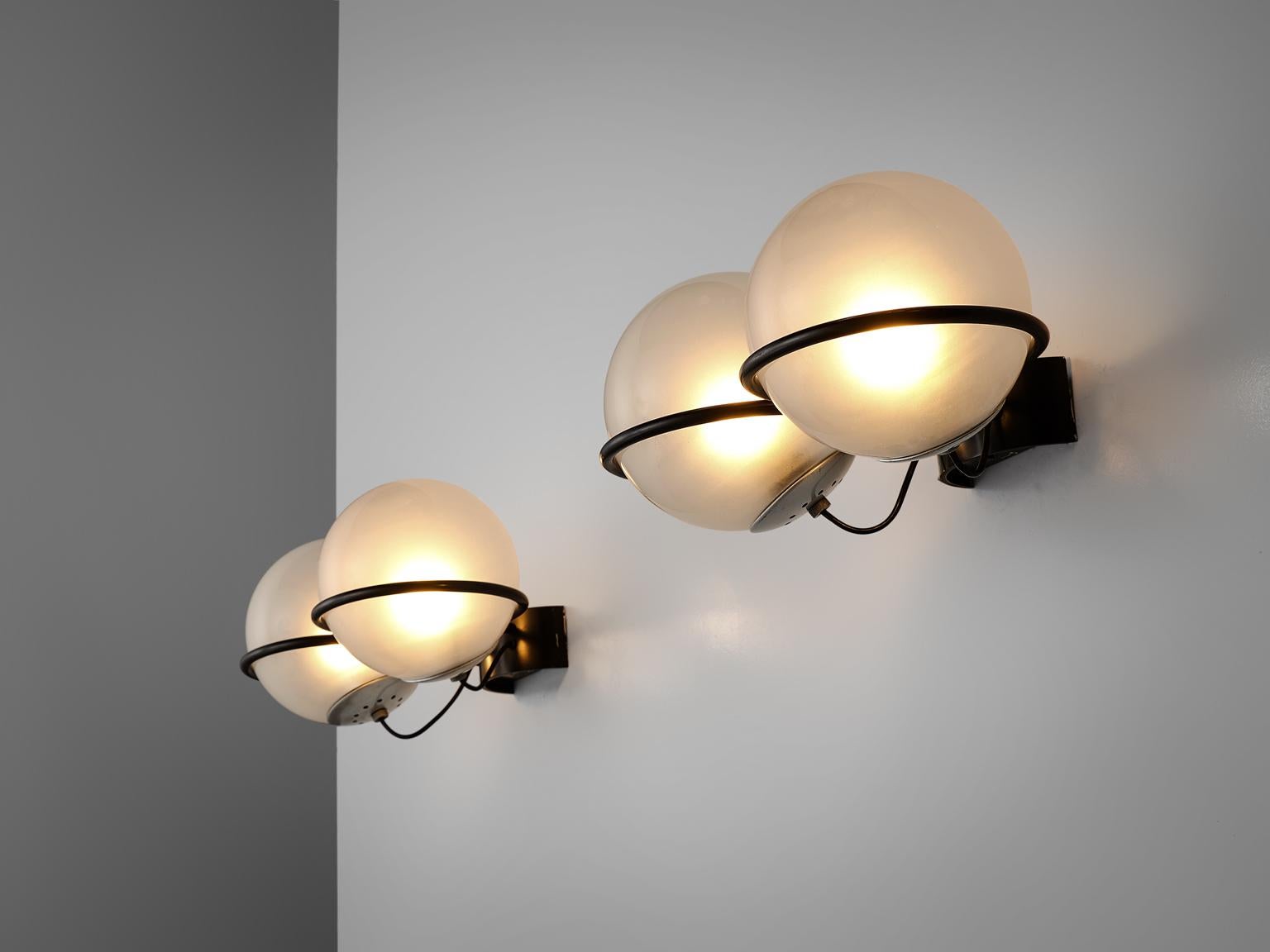 Arteluce, pair of double wall lights, black steel and opaque glass, Italy, 1970s. 

Set of wall lights with each two clear glass bulbs with black painted steel details. Inspired on the earlier designs of Gino Sarfatti for Arteluce. Equipped with