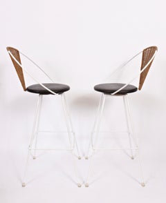Pair of Arthur Umanoff for Shaver Howard Iron, Rattan & Black Leather Bar Stools