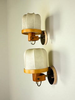 Pair of articulated "Cocoon" wall lights, resin and pine, Italy, 1970's
